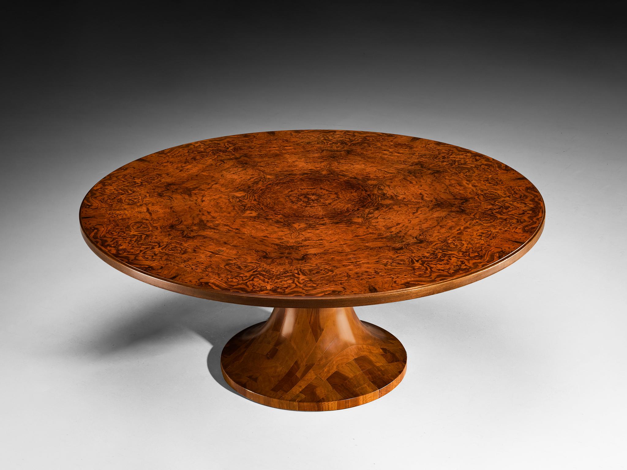 Dining table, walnut, walnut burl, Italy, 1960s

This beautiful Italian dining table, influenced by the artistic sensibilities of the Art Deco movement with a post-modern twist, is distinguished by its curvilinear form and exceptional woodwork. The