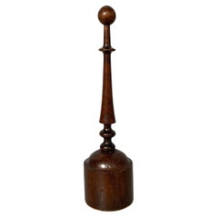 Italian round doorstop in turned wood, 1930s