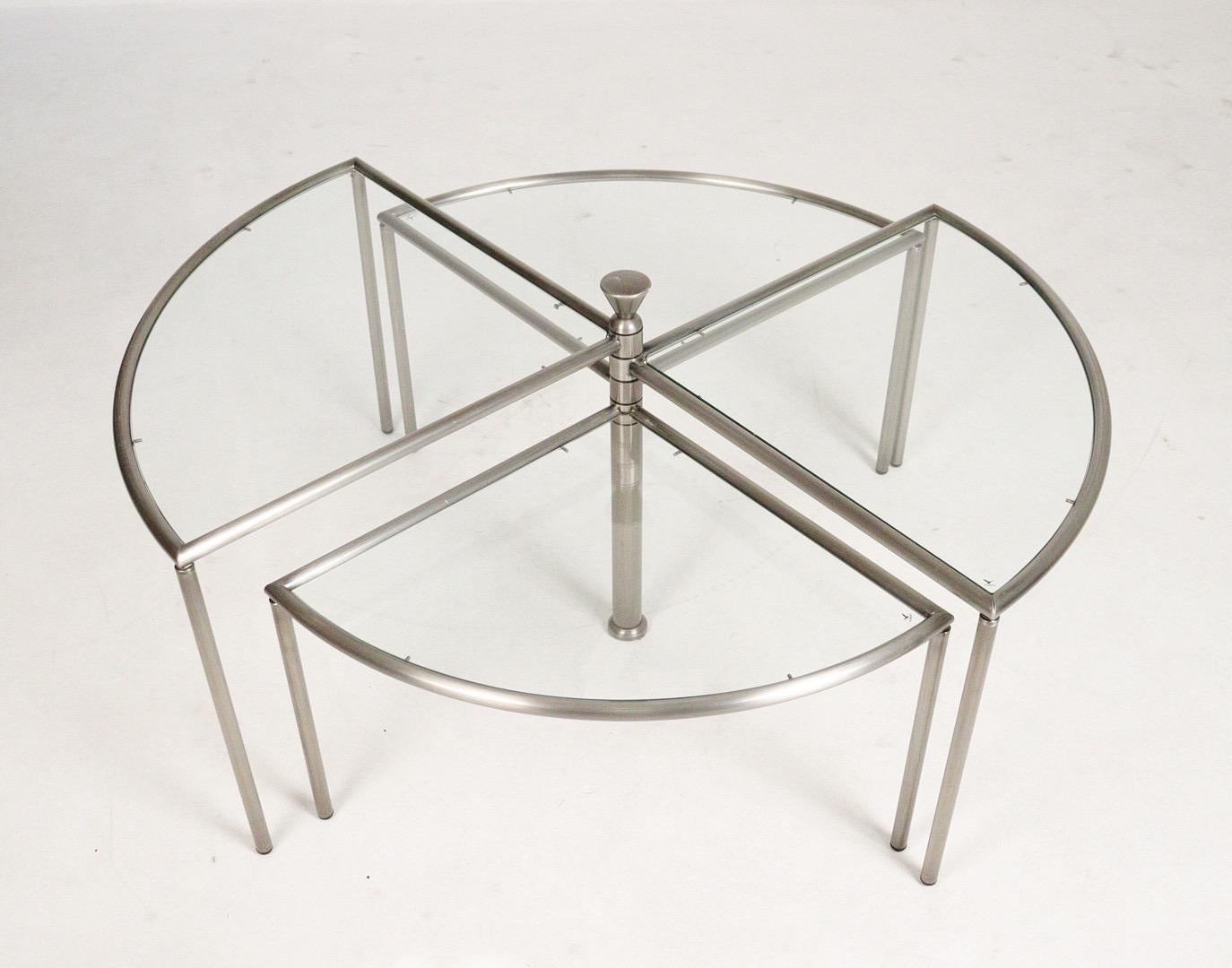Introduce sleek Italian style to your living space with this iconic side table from the 1970s. The table boasts a stunning metal construction with a chrome-plated finish, providing a striking and durable centerpiece that's built to