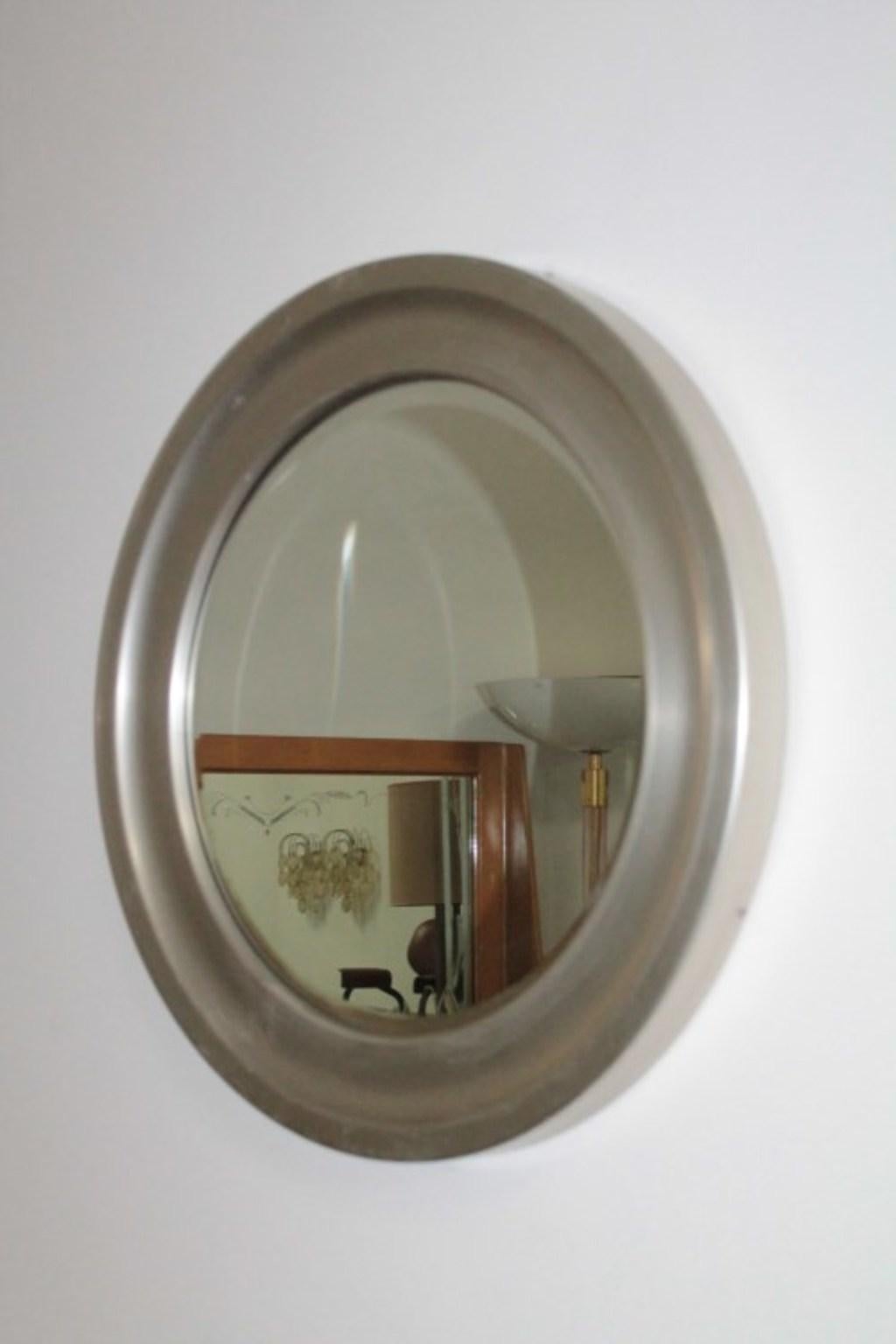 Round mirror 1960s in the style of Narciso Artemide.