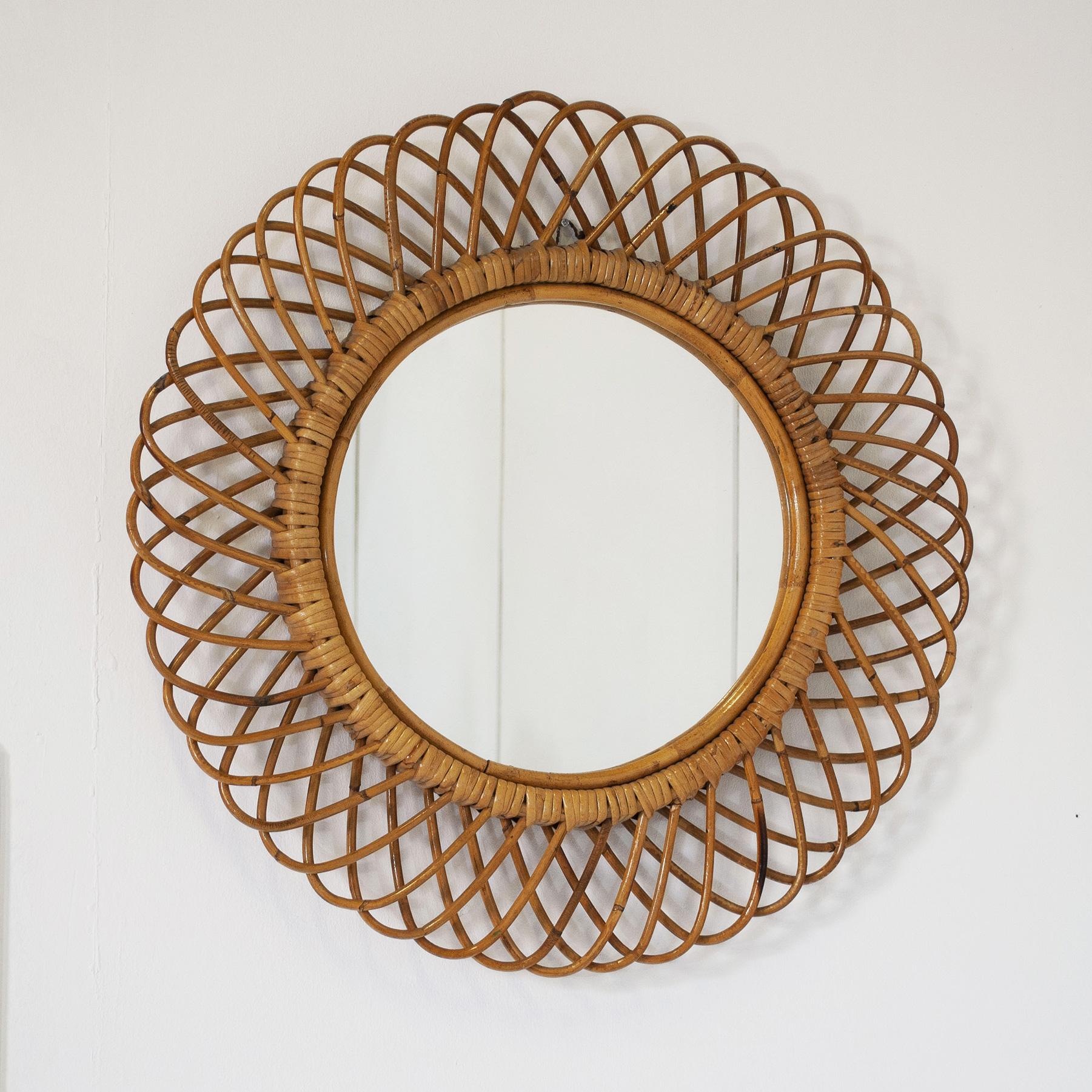 Mid-20th Century Italian Round mirror with woven wicker (india cane) frame. For Sale