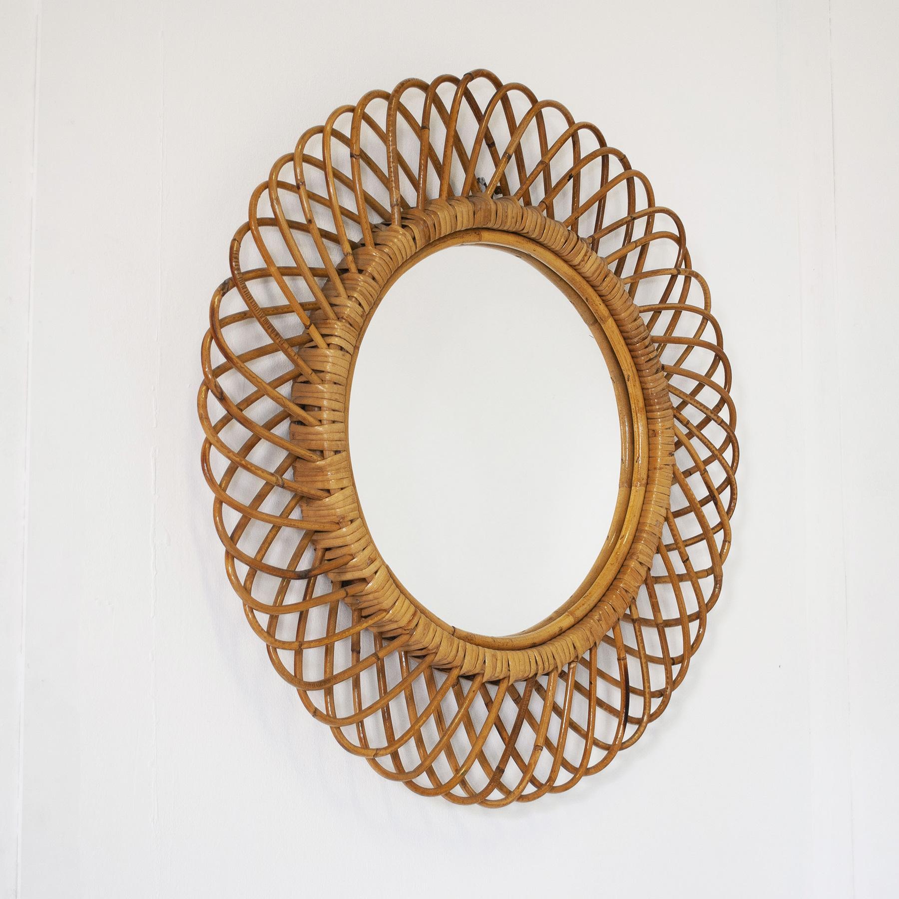 Italian Round mirror with woven wicker (india cane) frame. For Sale 1