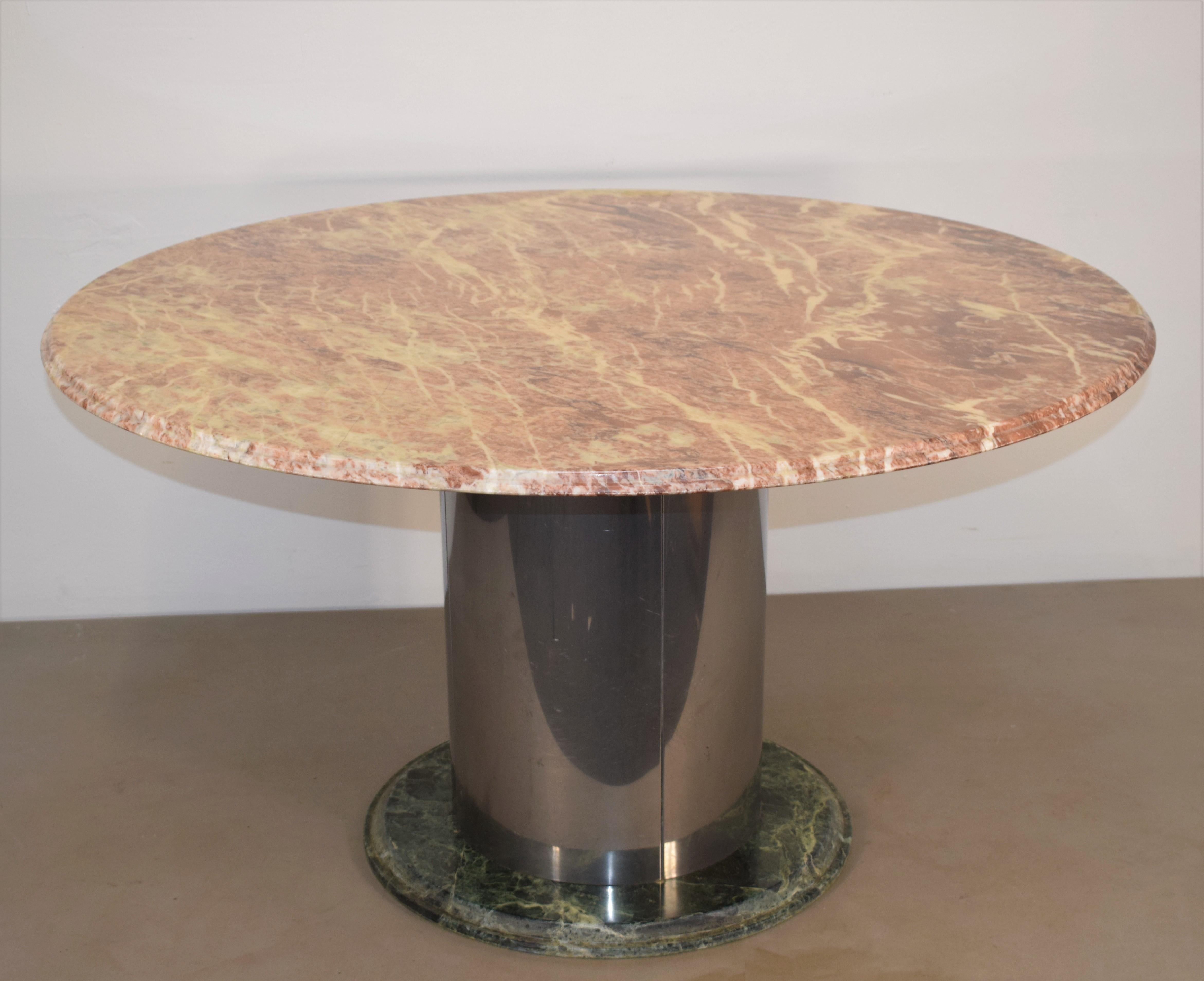 Italian round table, marble and steel, 1970s.

Dimensions: H= 67 cm; D= 123 cm; Depth marble = 2 cm.