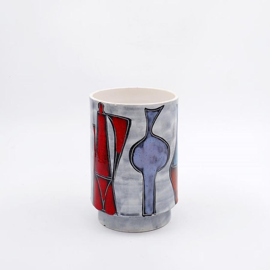 Vaso rotondo italiano con bottiglia e motivi floreali - anni 50/60
Decorazione di vasi - Ceramica - design
Misure: Ø 14cm H. 20cm 
Materiale: Ceramica
