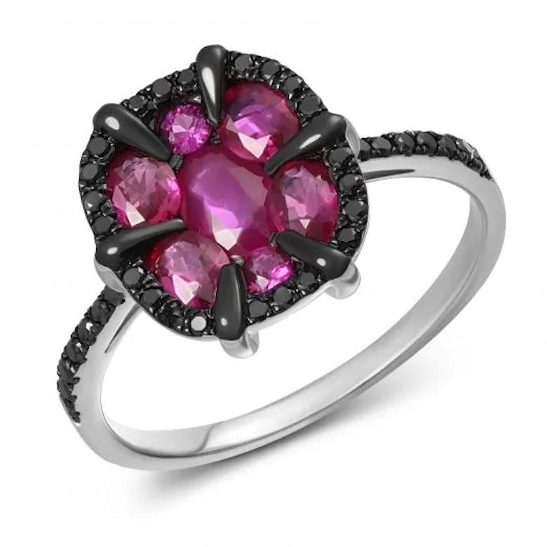 black ring with pink stone