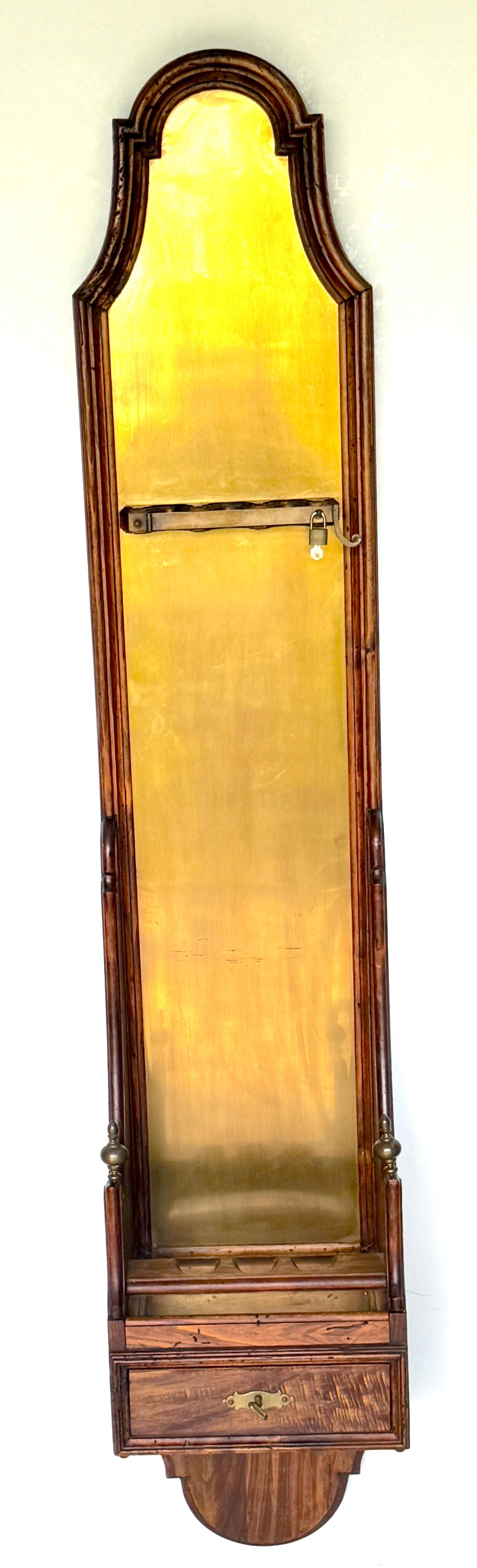 Italian Rustic Neoclassical Hanging Rifle Cabinet in Fruitwood and Brass, circa 1950s

A distinctive Italian rustic revival hanging rifle cabinet, crafted in fruitwood with brass fittings, dating to the mid-20th century. Designed in an elongated