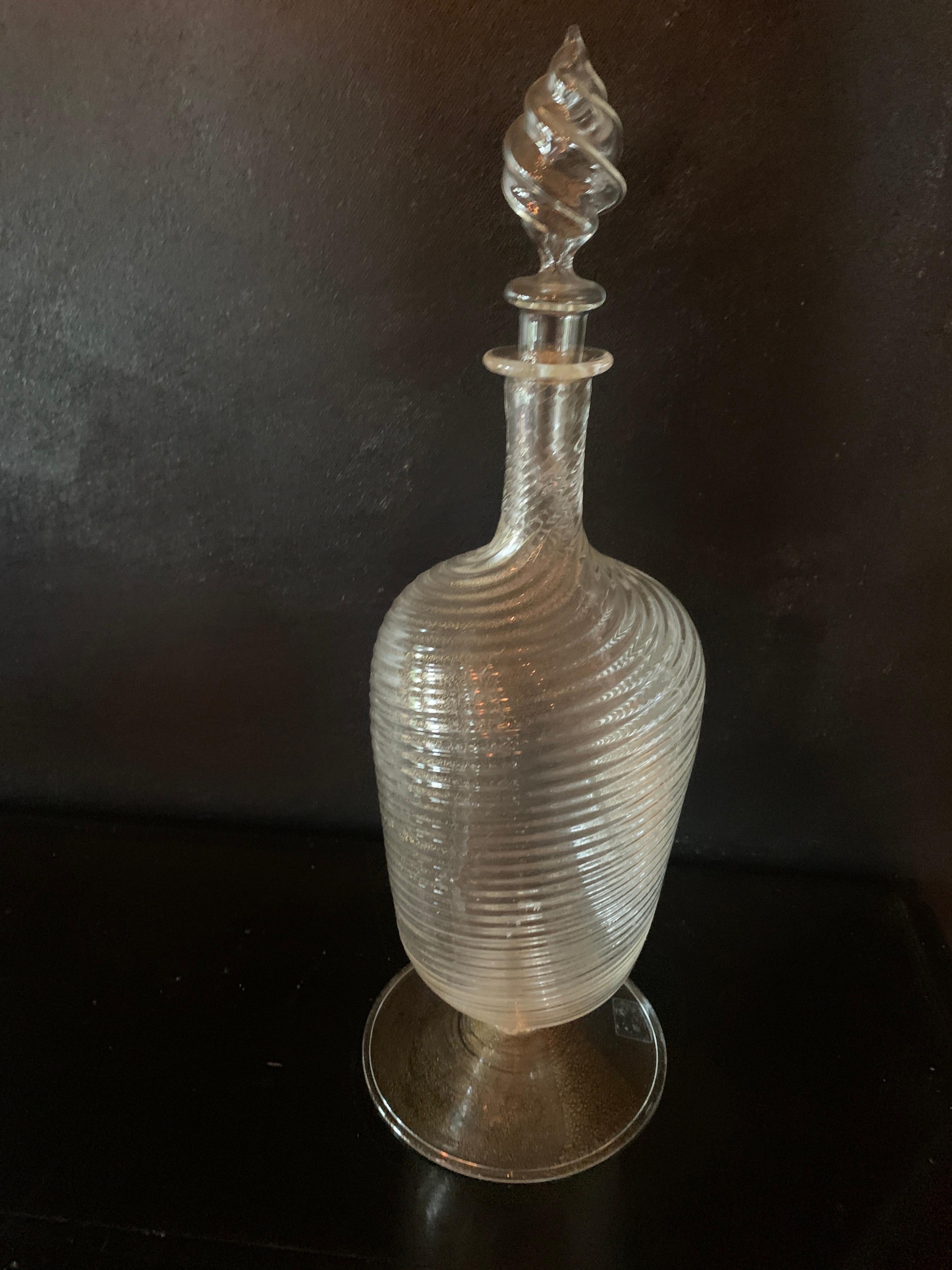 Italian Salviati Murano hand blown glass decanter with gold flecks, a lovely addition to the bar - for a luxurious look, the swirls of glass and inclusions of real gold flecks make this a stunning addition. The stopper is added, and while we love