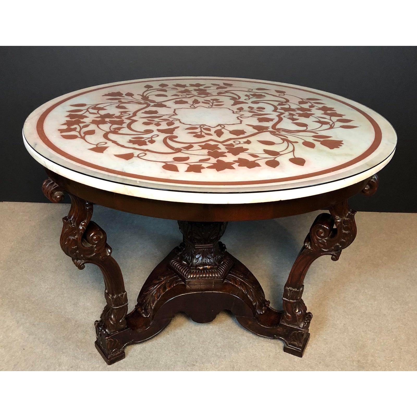 Italian Scagliola white marble-top carved wood center table. Made in the mid-19th century. High style with a Baroque influence.

 