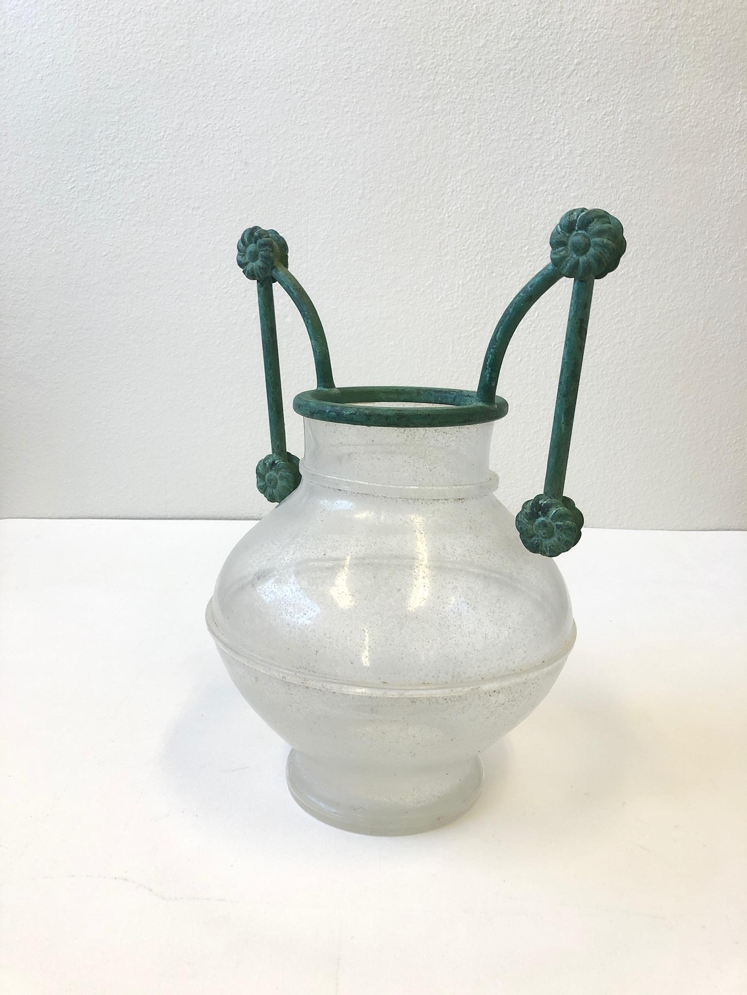 1980s Italian Scavo Murano glass vase with decorative patinated bronze handles.
Part of the Trozzelli designed by Silvia Buscaroli for Seguso Vetri d’Arte.
Measurements: 17.5” high, 12.75” wide and 12” deep.
