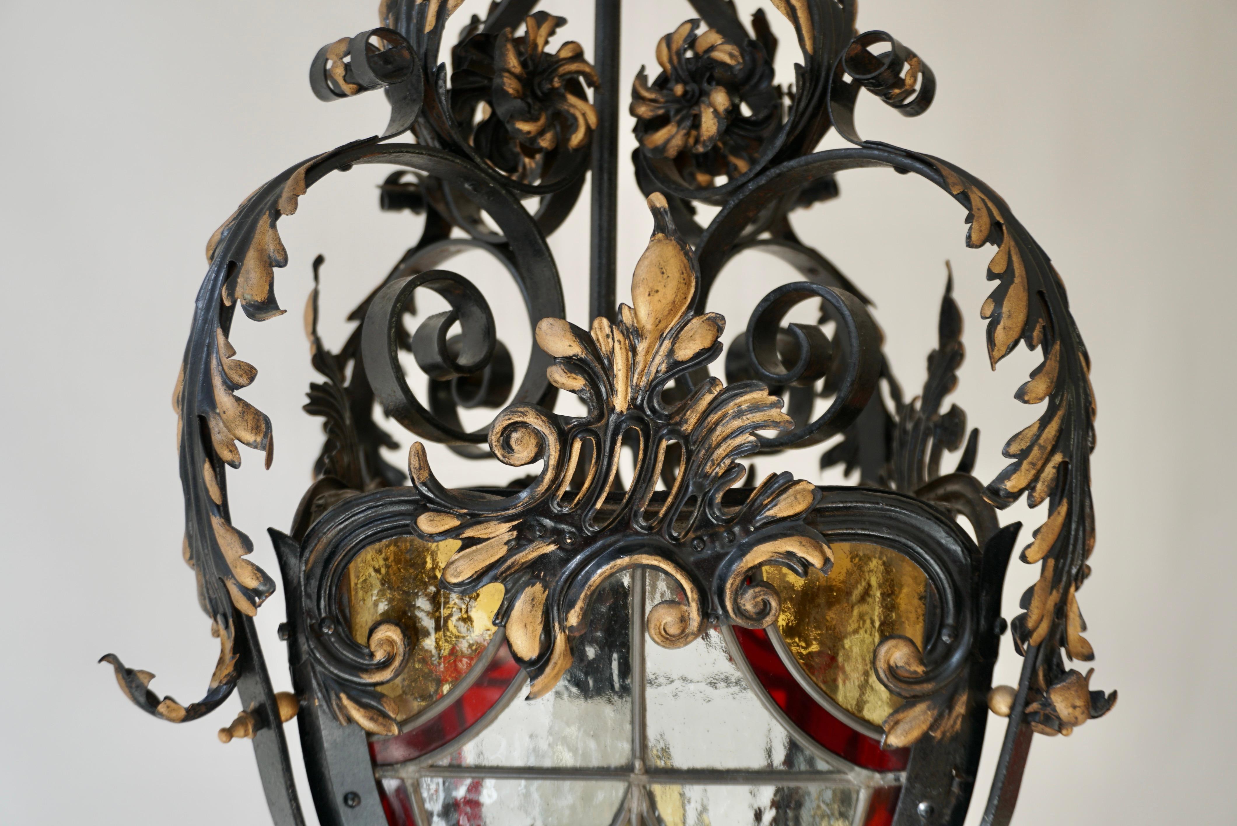  Italian Scrolled Wrought Iron and Stained Glass Hanging Hall Lantern, C. 1900 For Sale 8