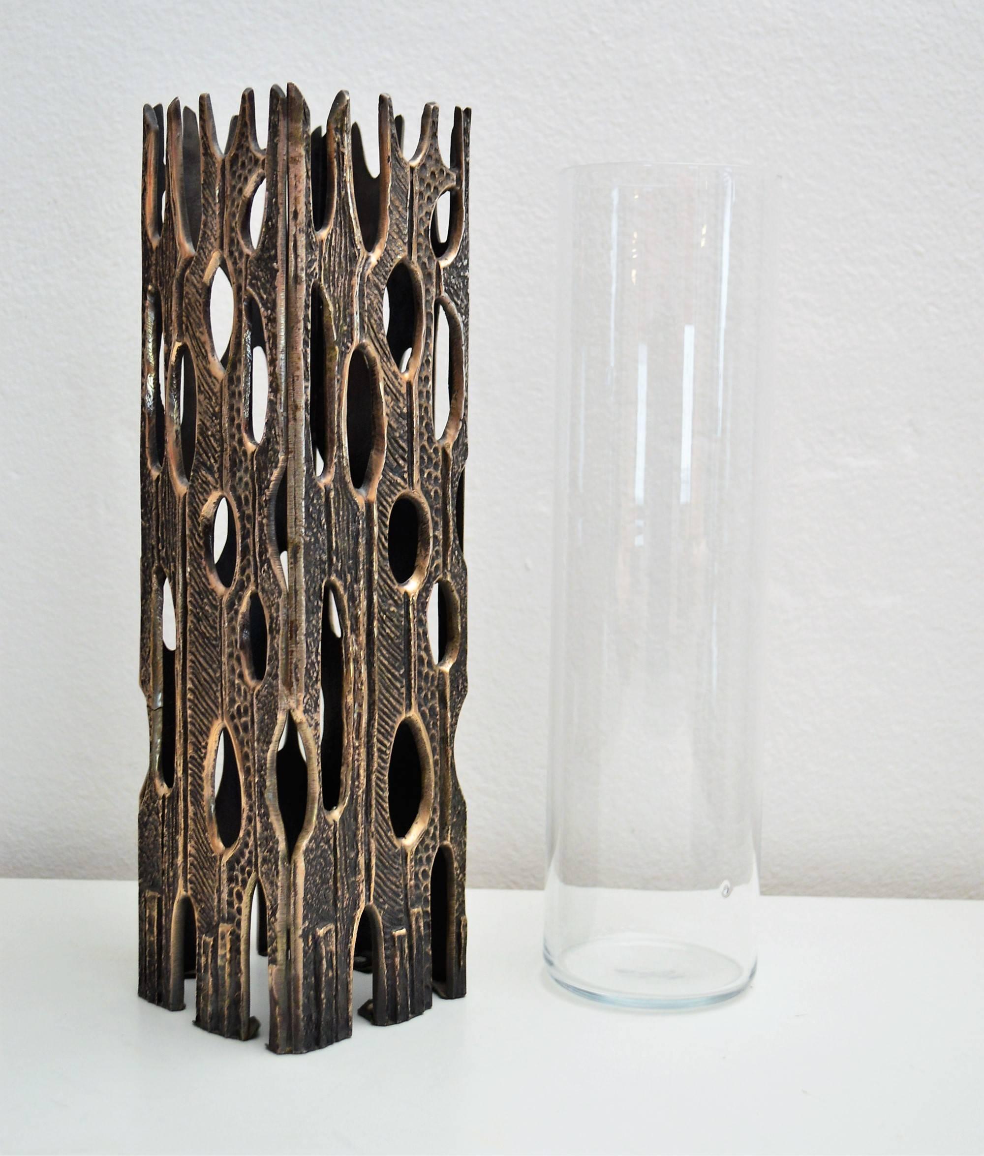 Gorgeous flower vase or sculpture handmade of heavy bronze with glass vessel inlet.
Manufactured in Italy in the 1960s, in the style of Luciano Frigerio.
Excellent condition.