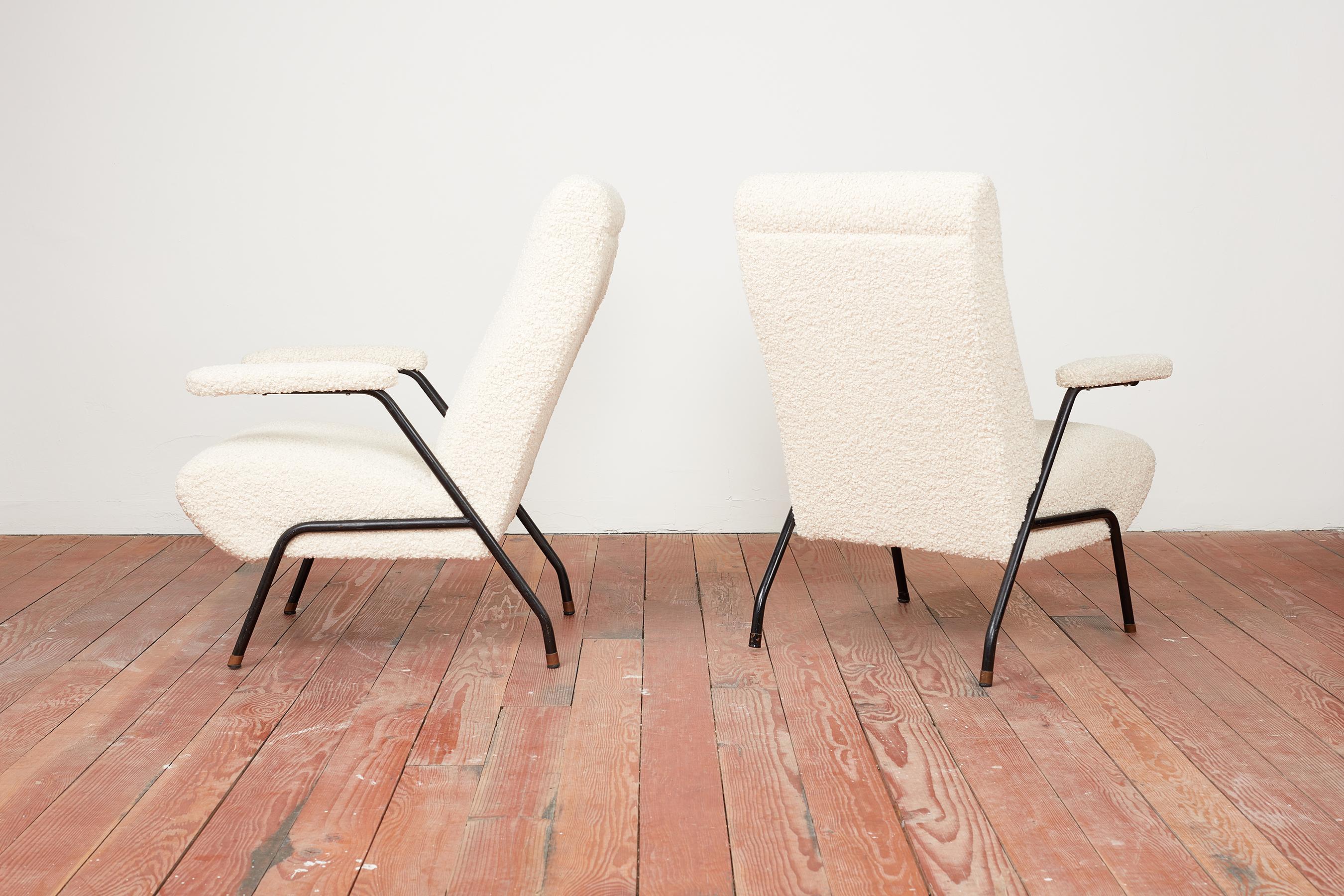 1950's Italian sculptural chairs newly upholstered in creamy white boucle.
Tubular black metal structure with sculptural shape
Floating arms and angular legs. 
Brass cap feet 
Great Italian design.

2 pairs available.