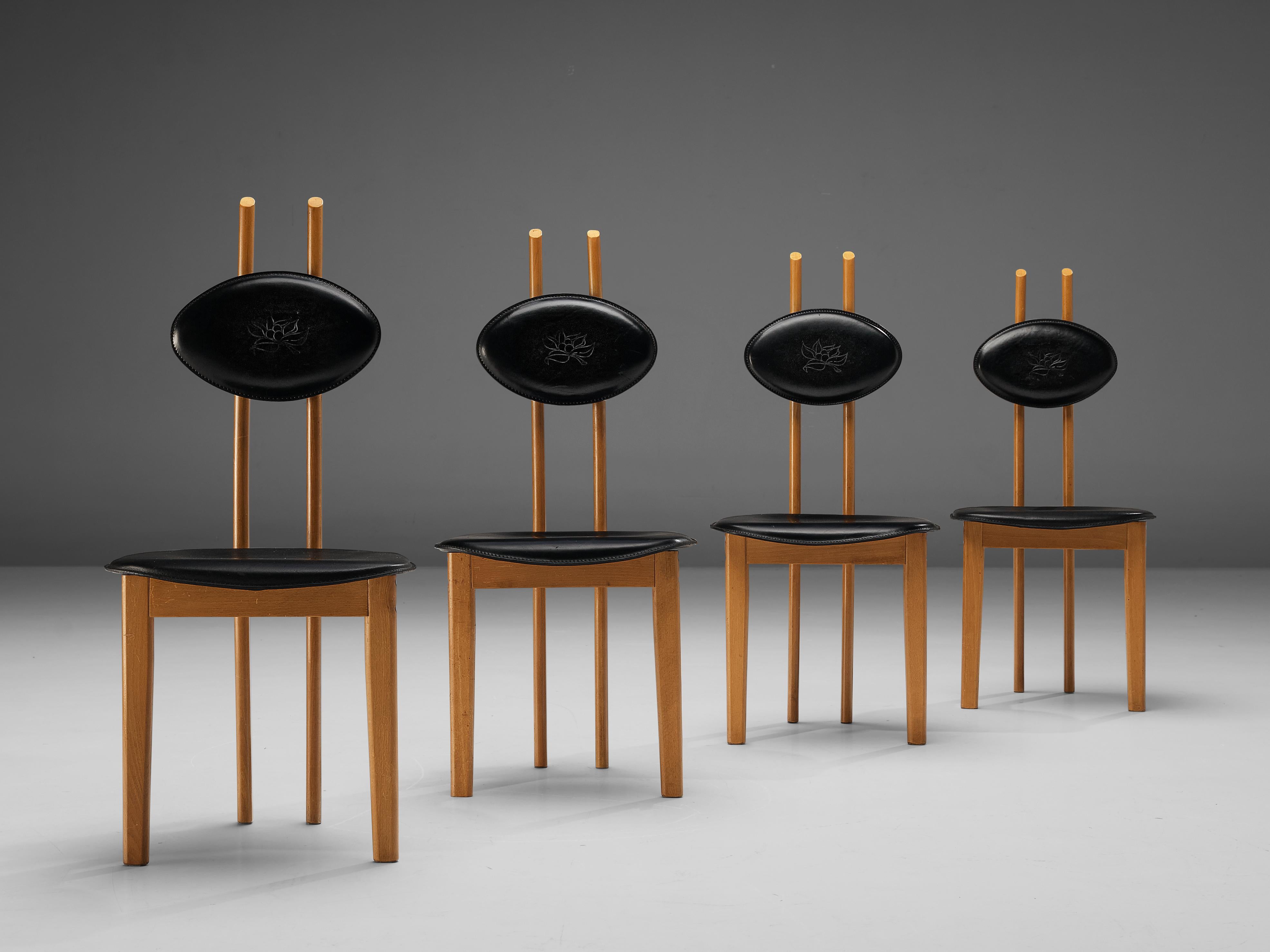 Chairs, leather, beech, Italian, 1950s 

Set of sculptural chairs that feature wonderful backrests, consisting of two long, round pillar legs that hold a leather backrest. The backrest has a nice imprint of a delicate flower. Just like the back