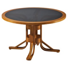 Used Italian Sculptural Dining Table in Plywood Maple and Smoked Glass