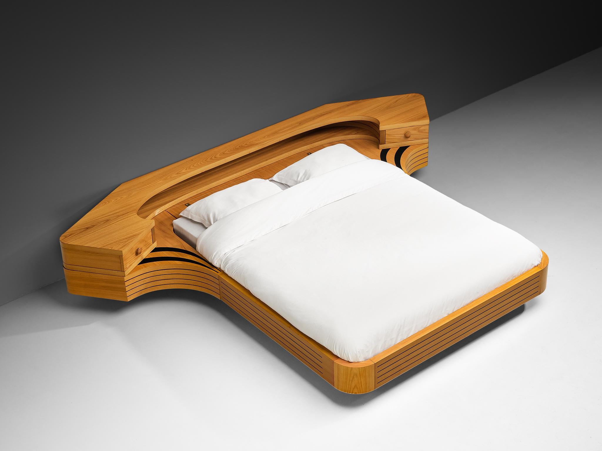 King Size bed, ash, wood, Italy, 1970s

A captivating and sculptural double bed, made in Italy in the 1970s. This piece has amazing quality, not only visible in the design itself but evident in its skillful execution. The bed is made in elm with