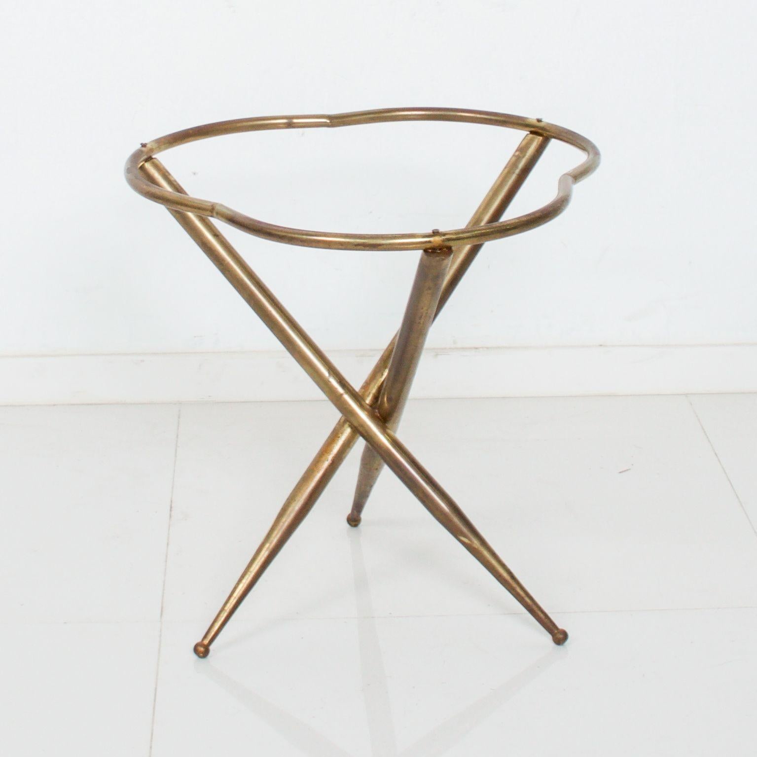 Vintage modern Italian Sculptural Side Tripod Table in Solid Brass and Patinated Bronze. 
Made in Italy circa 1950s.
Table features a custom glass top.
Table is attributed to Gio Ponti. 
No label remains. 
17.5 H x 17.25 in diameter.
Original