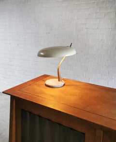 Lámpara de mesa escultórica italiana de Lumen Milano, años 50