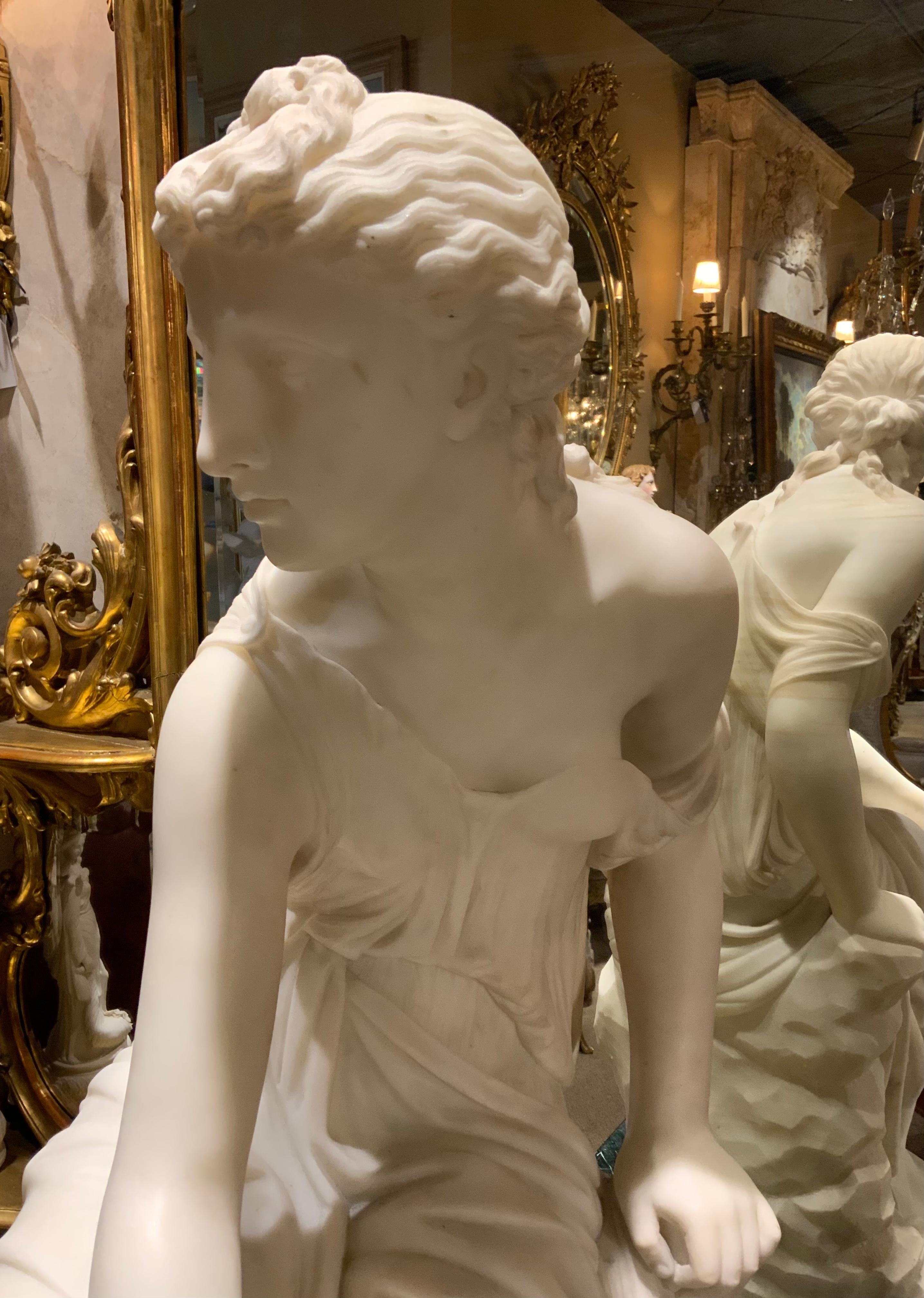 The perfection in the carving technique makes this sculpture very
Special. It is carved from a fine carrara white marble with artistic 
Perfection. The folds in her gown and draping of the garment 
Is exceptional. The features of the face and