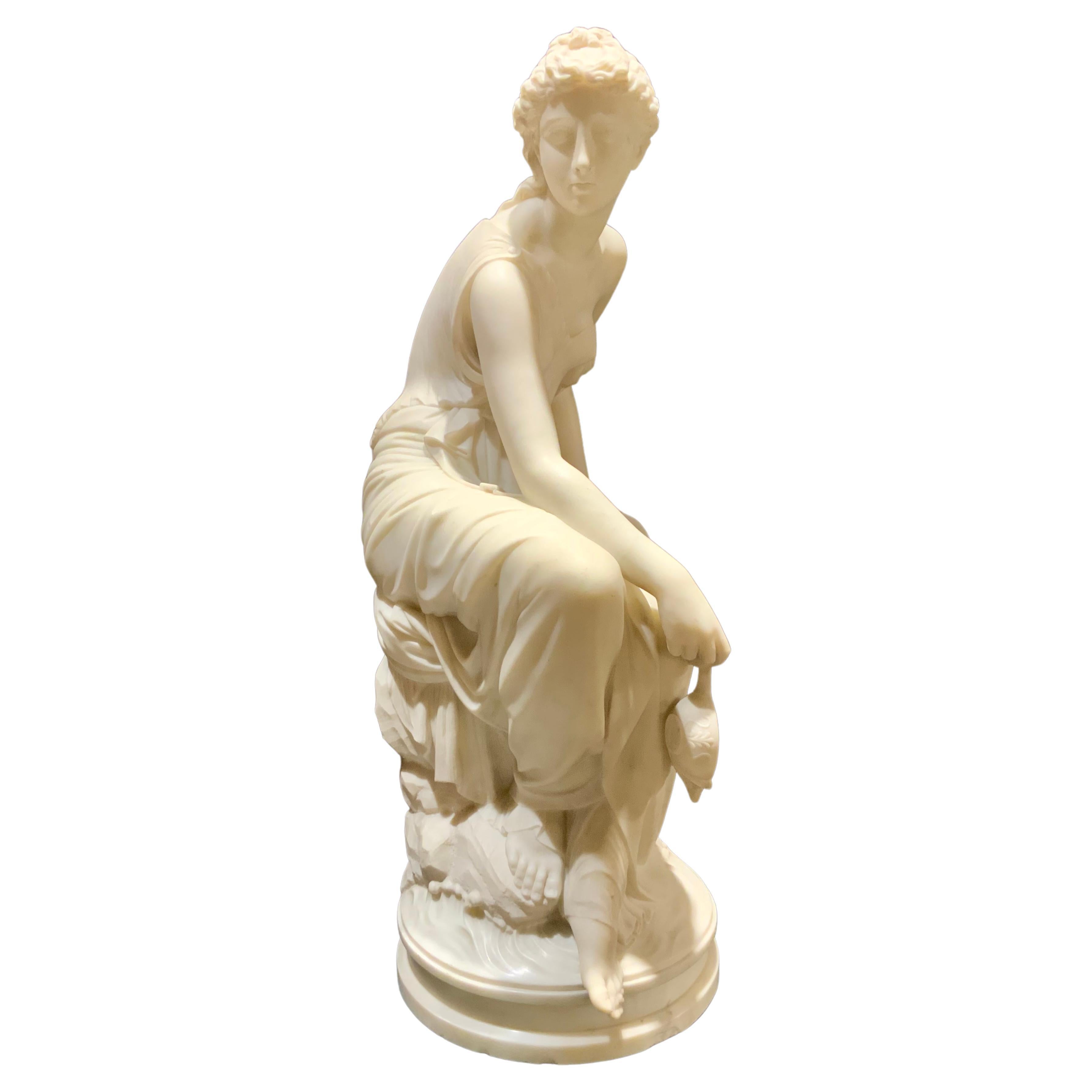 Figure assise d'une sculpture en marbre de Carrare d'une Vierge gitane en vente