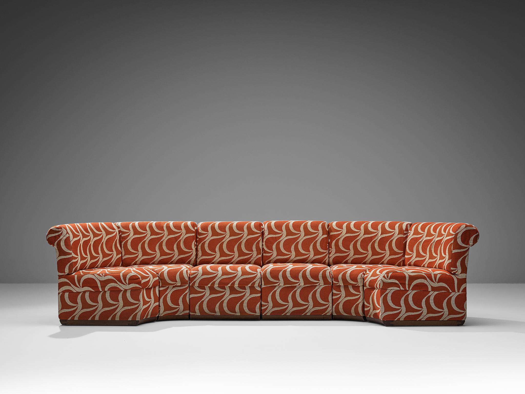 red patterned sofas