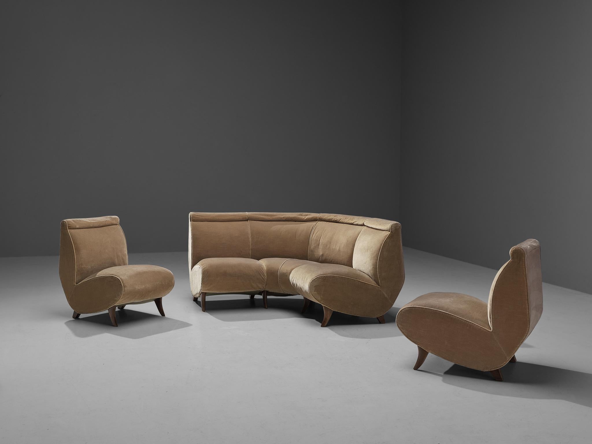 Modular sofa, velvet, beech, Italy, 1960s

This characteristic sofa of Italian origin finds itself at the intersection of art and design. This sofa is characterized by a splendid construction consisting of one right-angled sofa and two singular