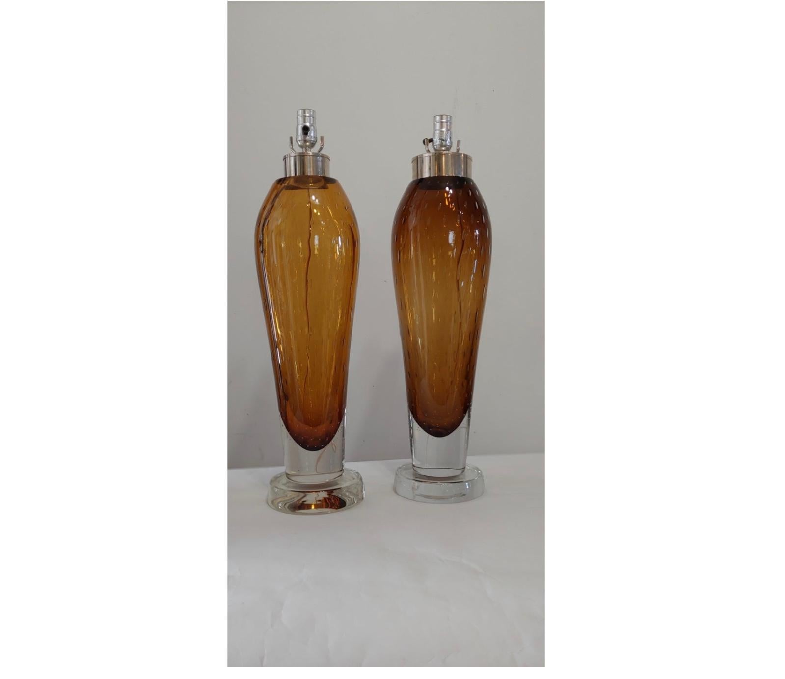 Italian Seguso Somerset Murano table lamps
Attributed to Flavio Poli
The interior is a warm light coffee brown color surrounded by clear glass.