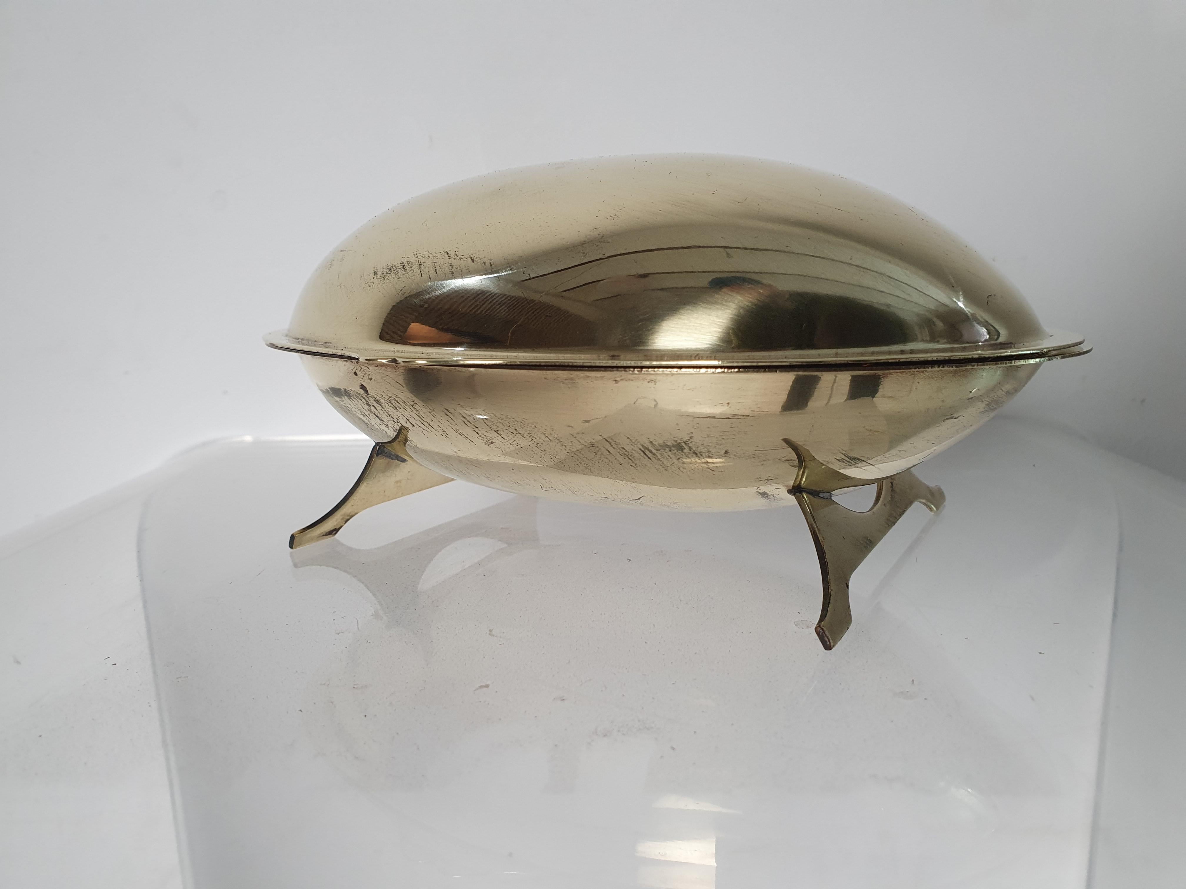 This cute Italian serving dish from the 1970s is made in metal with an egg shaped form. It has a practical lid and could be used for a range of things such as olives, sugar, salt, nuts, caviar, dates or whatever you fancy. 



.