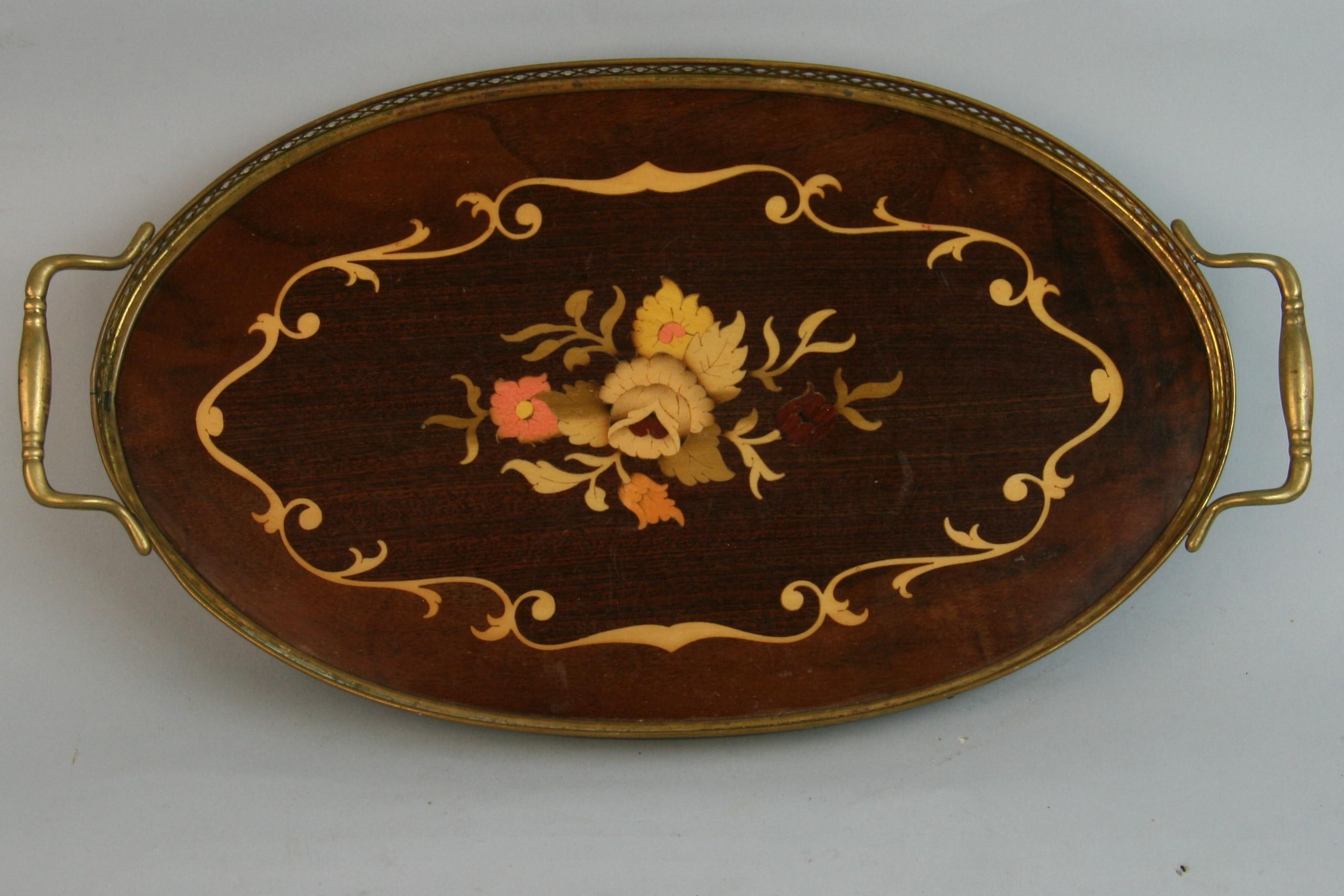 1338 Italian inlaid wood serving tray with protective coating with brass filigree rim and handles.