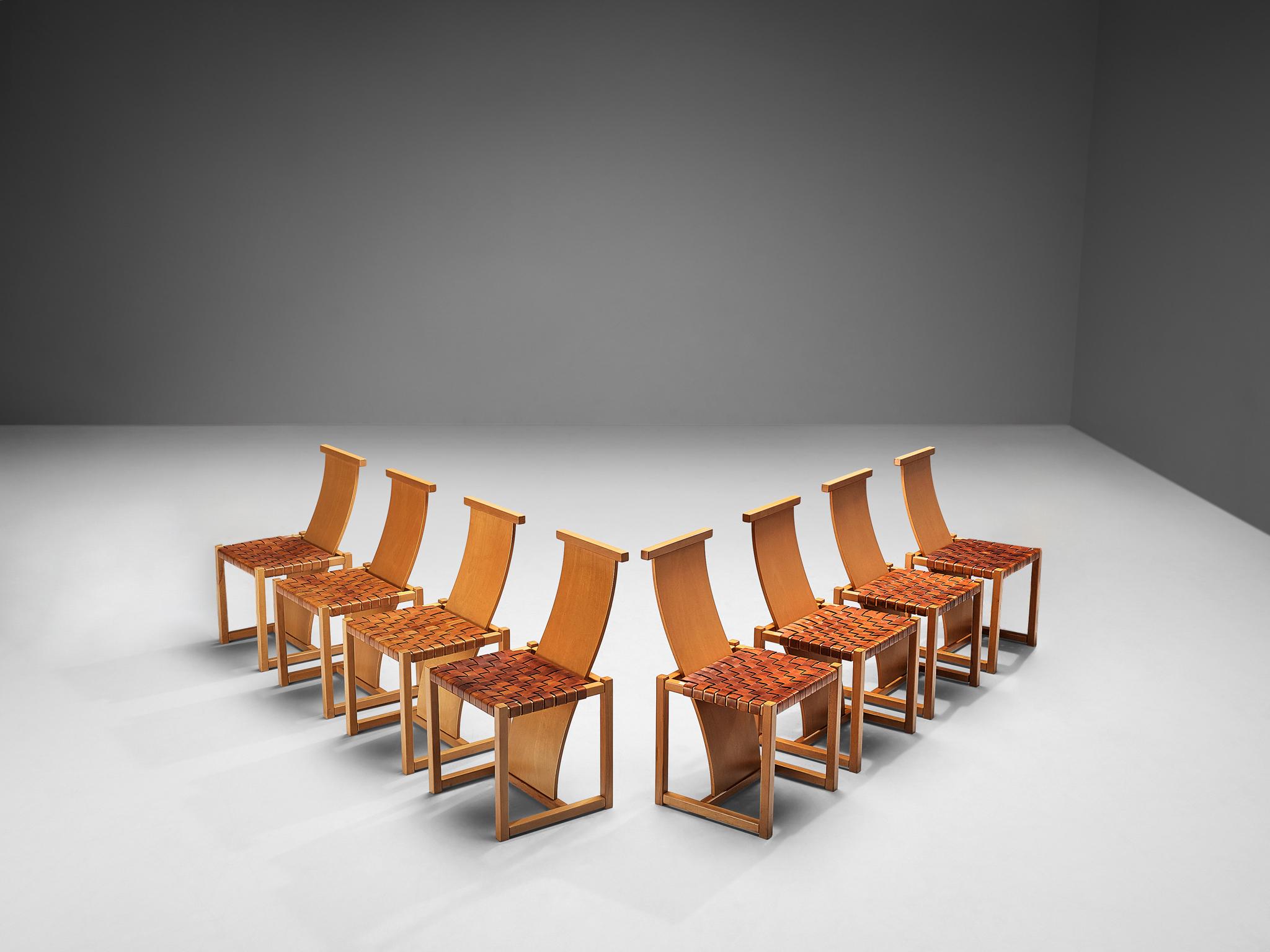 Set of eight dining chairs, leather, beech, Italy, late 1970s

Stunning set of eight sculptural and impressive dining chairs. These chairs have a frame and long backrest in beech. The backs of these chairs are long and wavy and are intertwined in