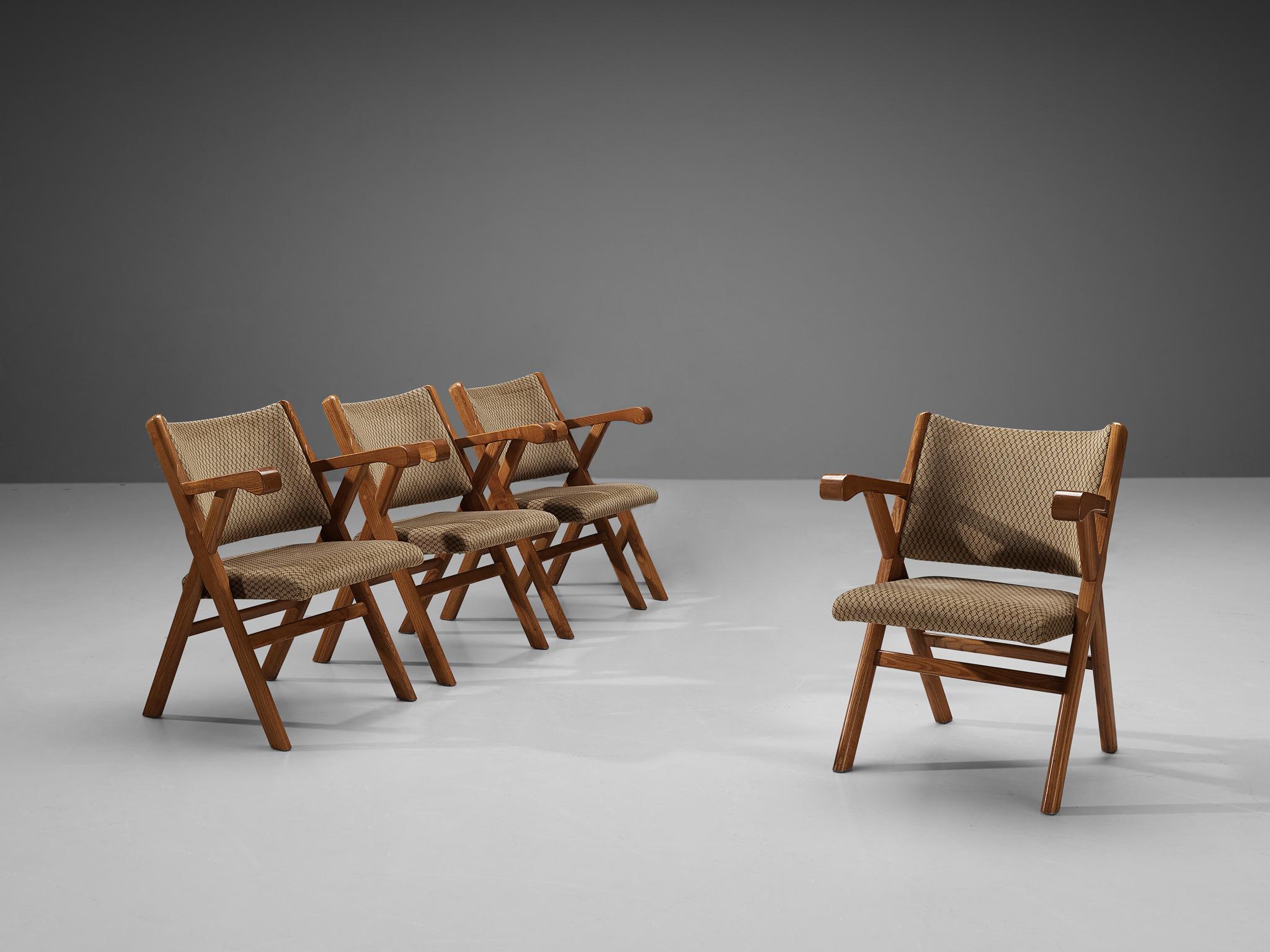 Set of four armchairs, ash, fabric, Italy, 1960s. 

Sturdy Italian armchairs in solid ash and beige checkered pattern upholstery. The x-framed design elevates the overall elegancy of this rustic chair. Moreover the armrests of these armchairs show