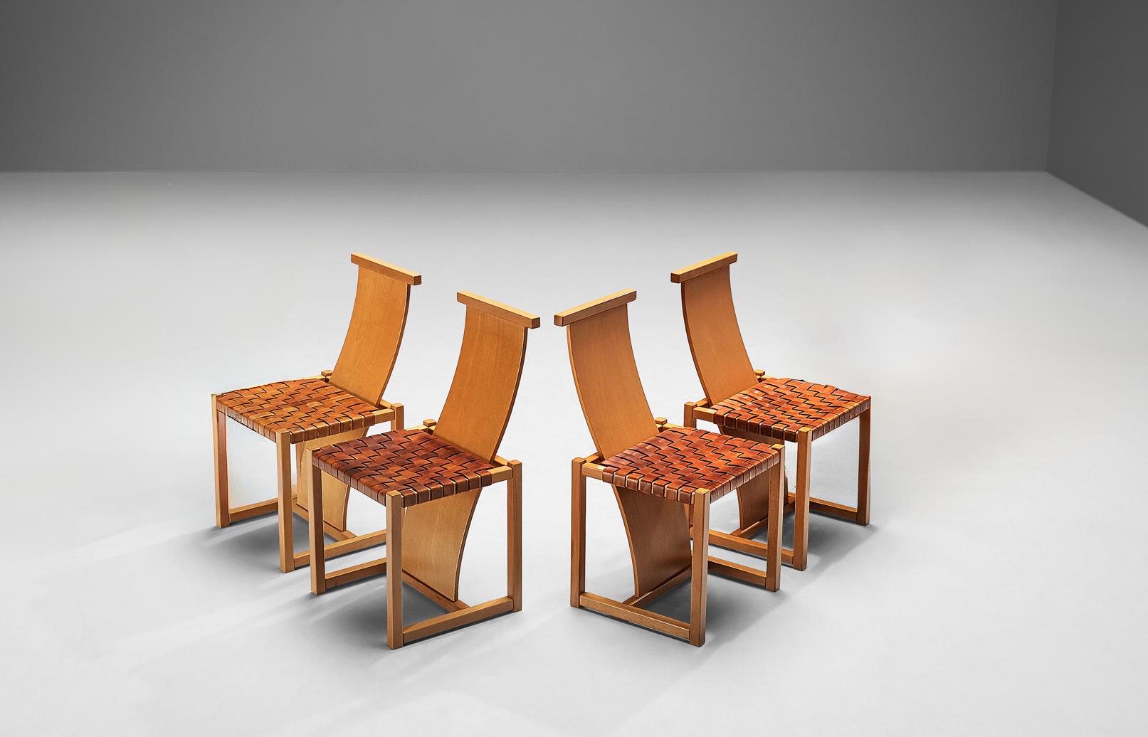 Set of four dining chairs, leather, beech, Italy, late 1970s

Remarkable set of four of sculptural and impressive dining chairs. These chairs have a frame and long backrest in beech. The backs of these chairs are long and wavy and are intertwined in