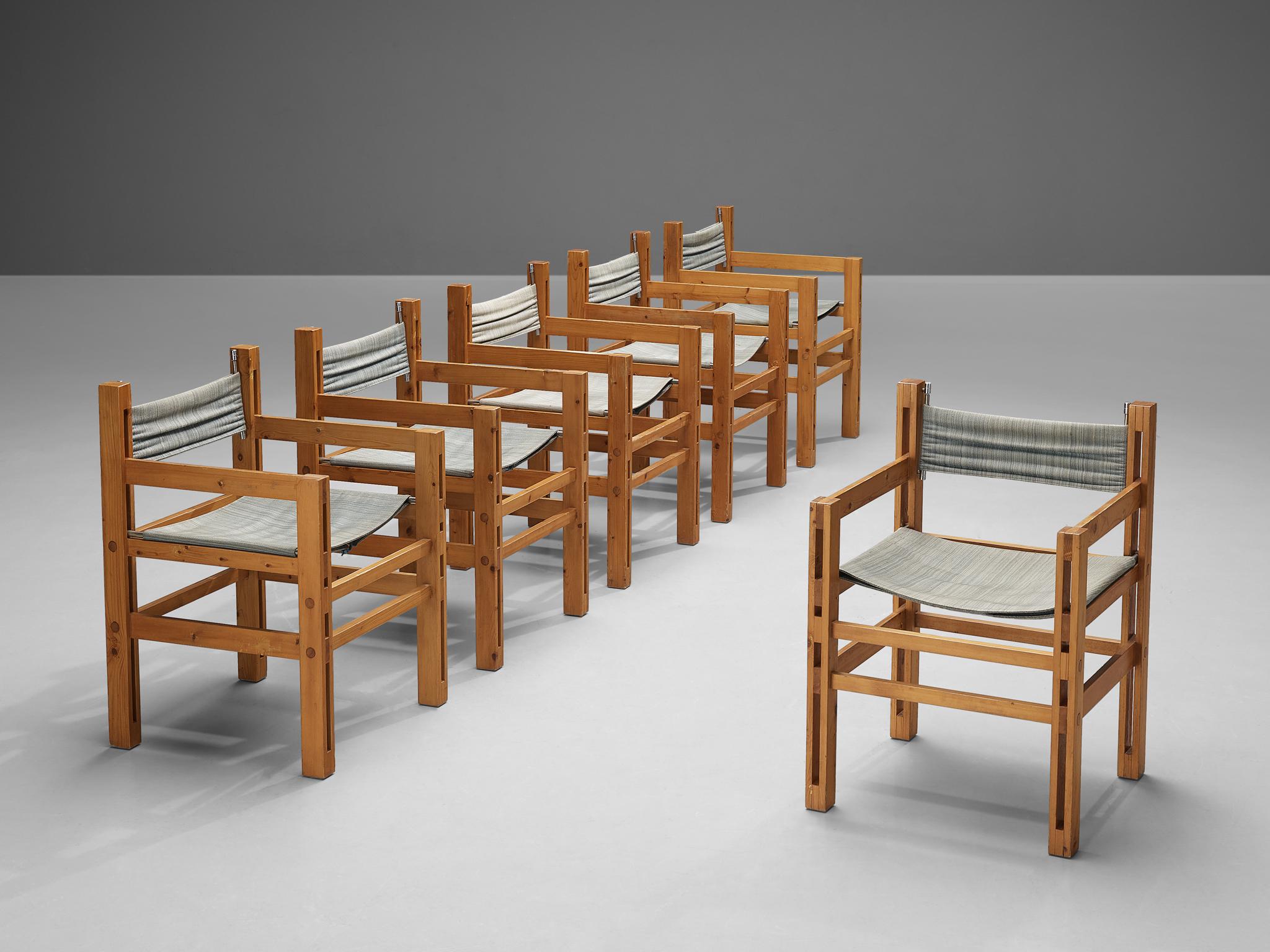 Set of six armchairs, pine and fabric, Italy, 1970s.

This set of six armchairs from Italy is strict and pure. The chairs feature an architectural pine wooden frame, build up from only horizontal and vertical lines. The vertical slats of the