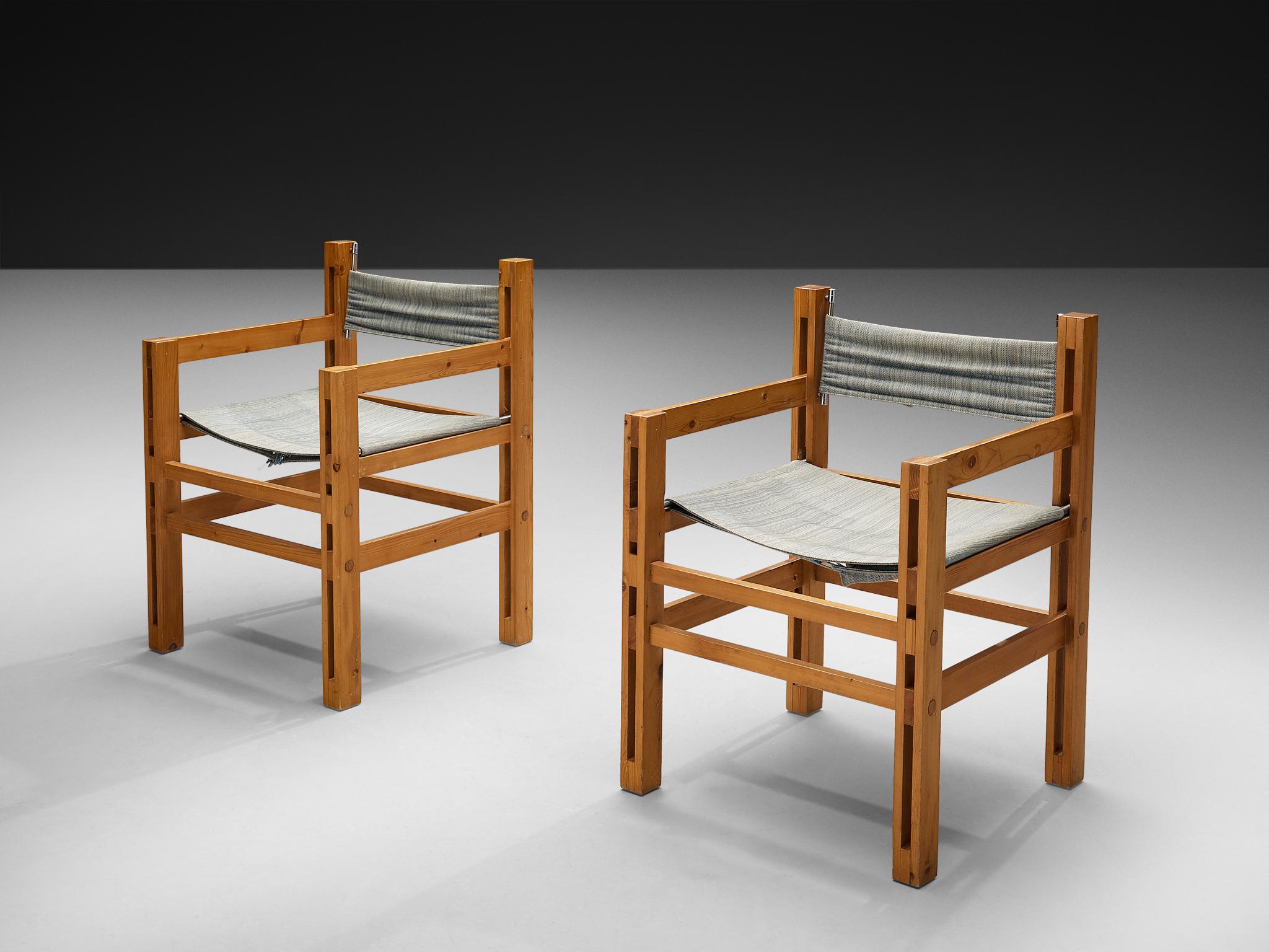 Set of six armchairs, pine and fabric, Italy, 1970s.

This set of six armchairs from Italy is sleek and pure. The chairs feature an architectural pine wooden frame, build up from only horizontal and vertical lines. The vertical slats of the armrests