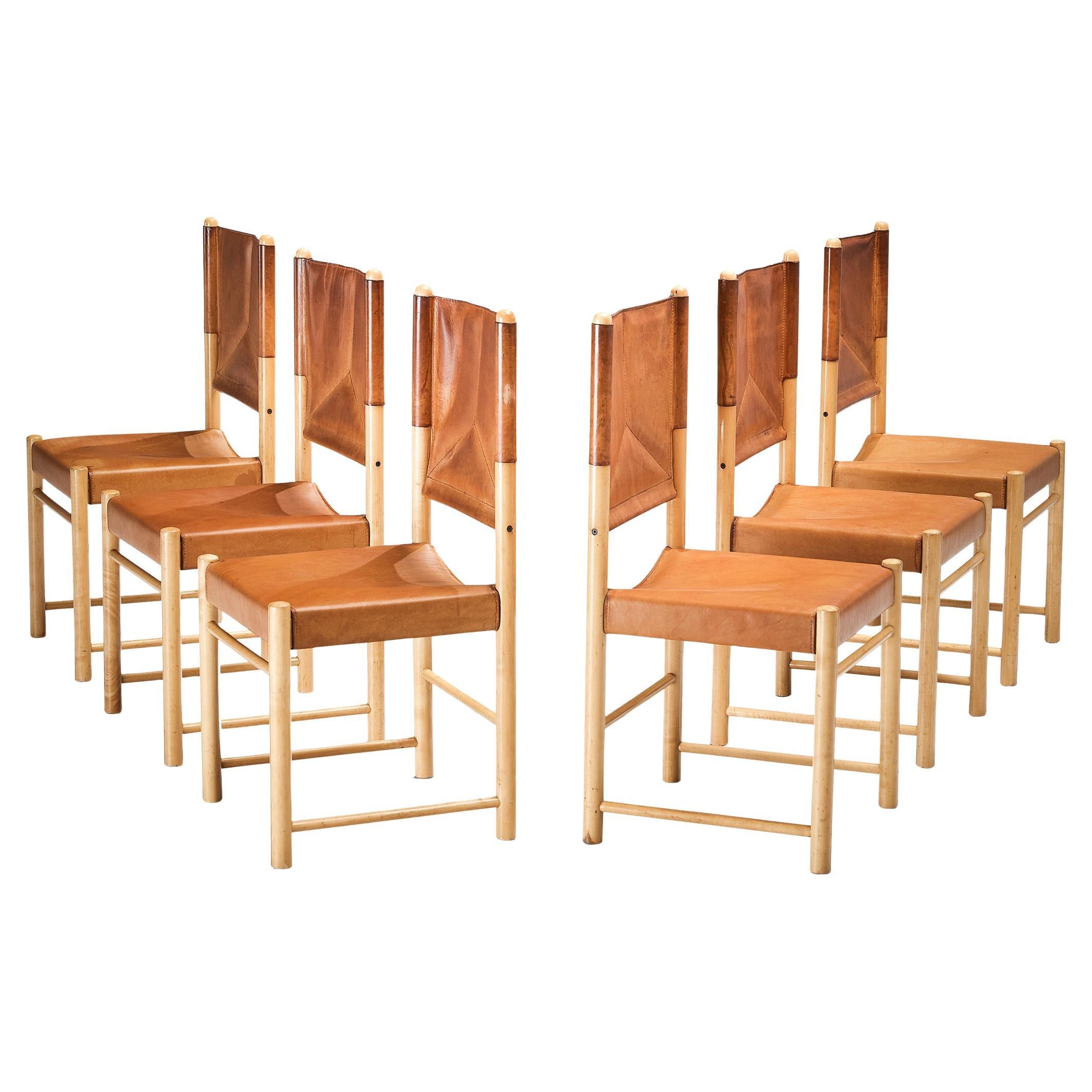 Ensemble italien de six chaises de salle à manger en cuir cognac en vente