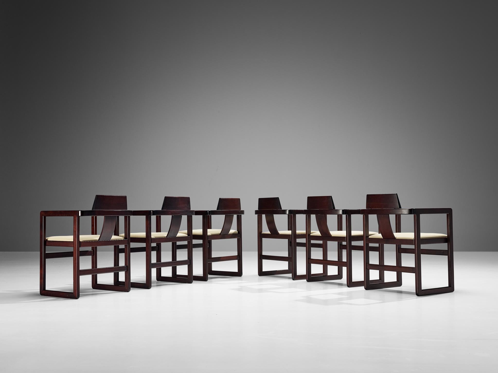 Set of six armchairs, stained beech, leatherette, Italy, 1970s.

Simplistic yet elegant Italian set of six dining chairs. Straight geometric lines are prominent in the execution, for example to be seen in its dark stained wooden frame. An elegant