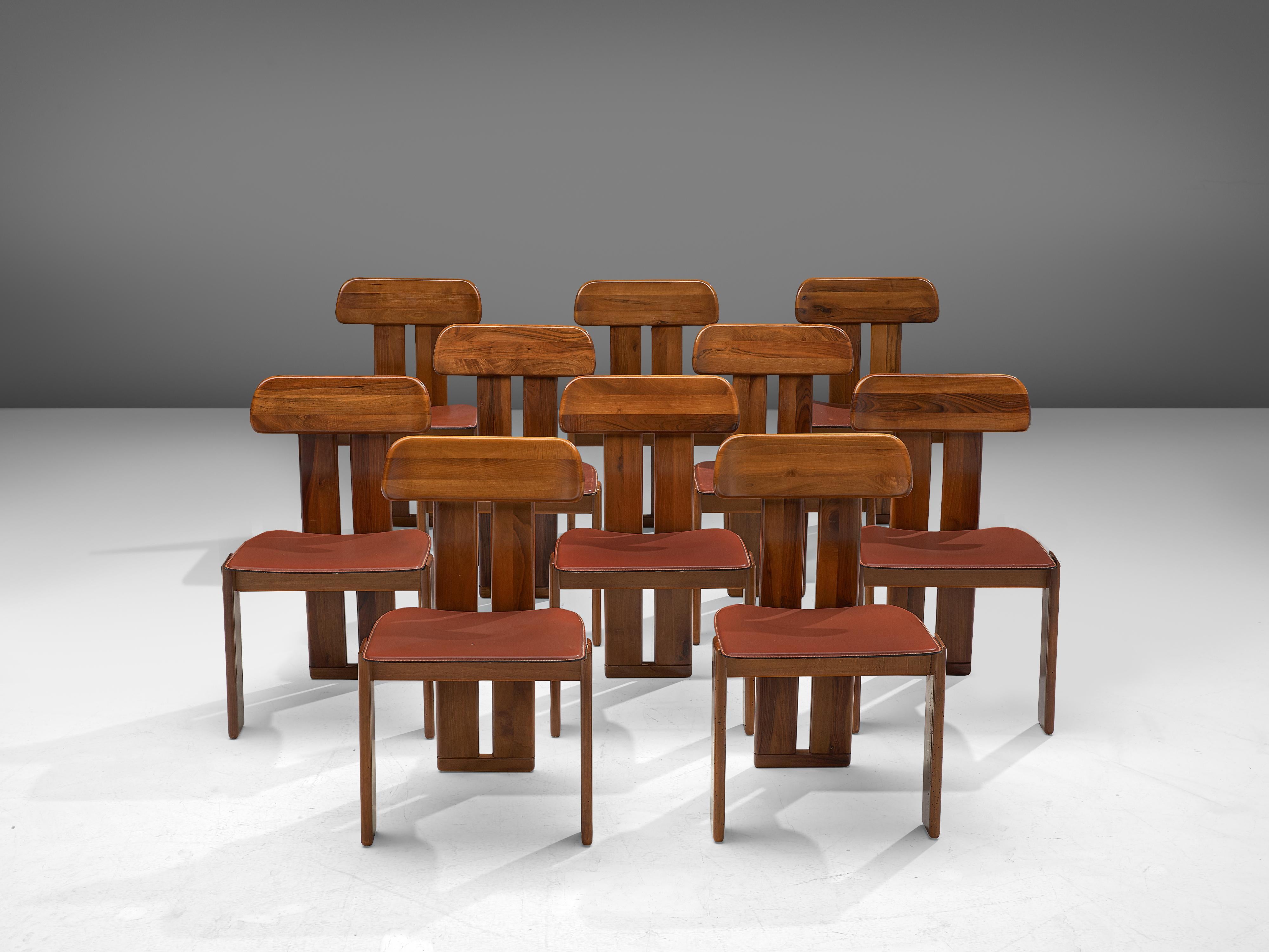 Sapporo for Mobil Girgi, set of 10 dining chairs, Italian walnut and cognac leather, Italy, 1970s.

Set of ten sculptural chairs that feature wonderful backrests, consisting of two vertical slats distanced from each other. At the bottom and top