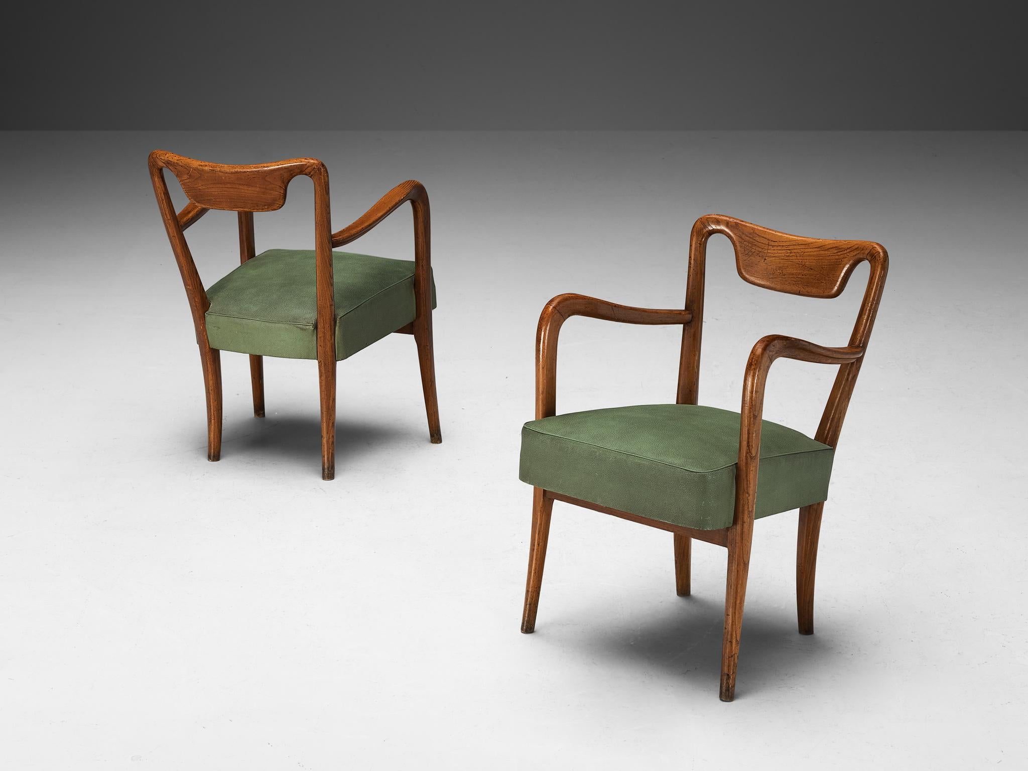 Imitation cuir Ensemble italien de dix chaises de salle à manger en teck et tapisserie verte  en vente