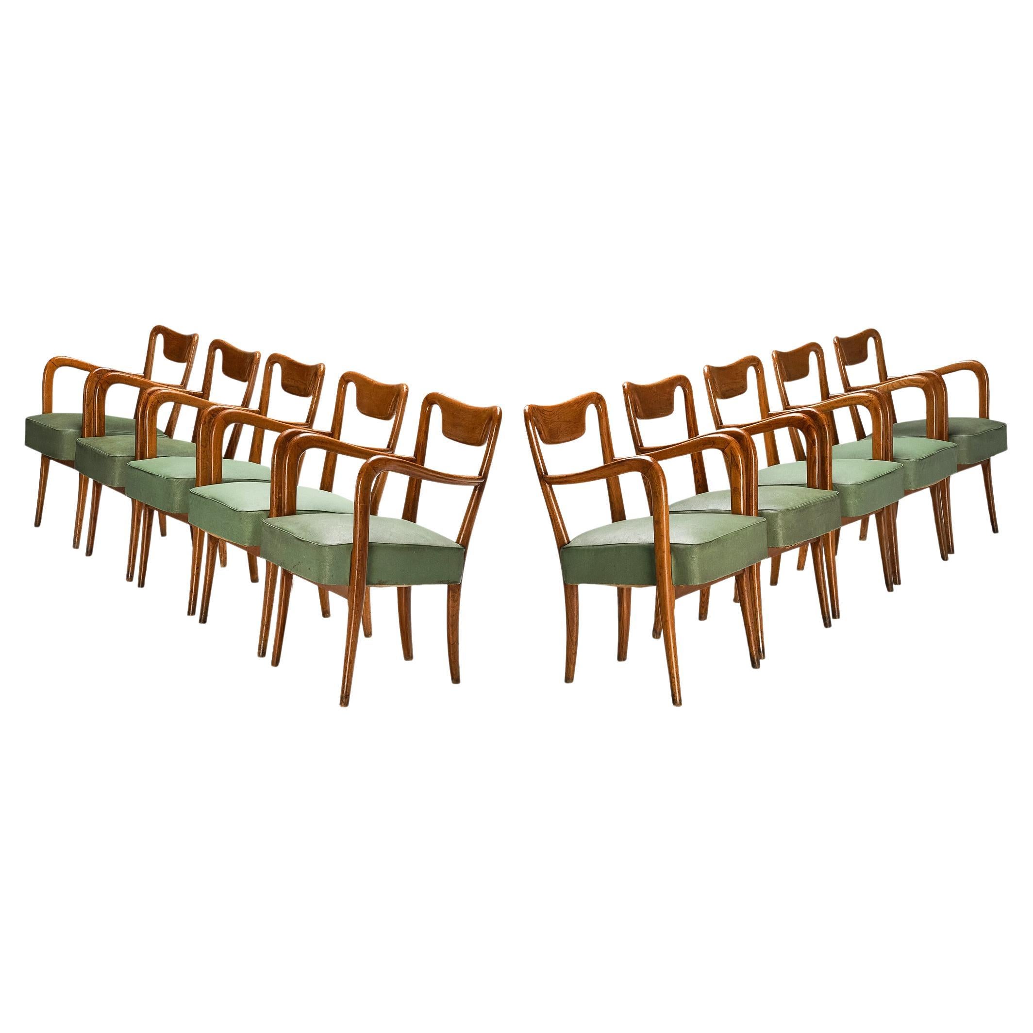 Ensemble italien de dix chaises de salle à manger en teck et tapisserie verte  en vente