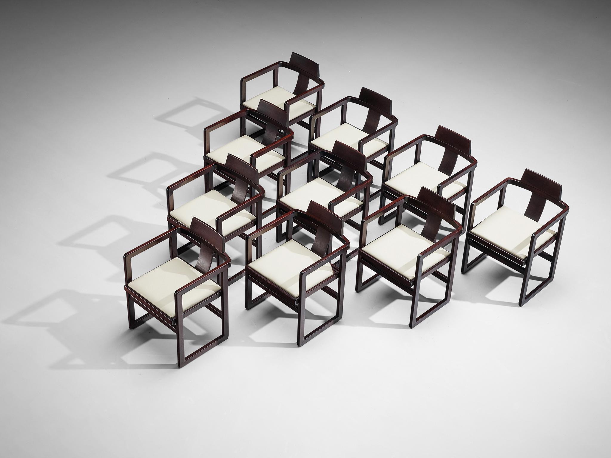 Set of ten armchairs, stained beech, leatherette, Italy, 1970s.

Simplistic yet elegant Italian set of ten dining chairs. Straight geometric lines are prominent in the execution, for example to be seen in its dark stained wooden frame. An elegant