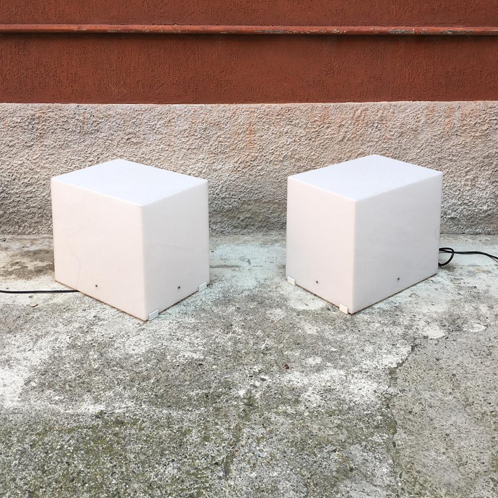 Italian vintage set of two parallelepiped floor lamps in white plexiglass, 1970s
White plexiglass floor lamps, useful like coffee tables. Electric cablage verified, good condition.
Measures: 31 x 45 x 40 H cm.