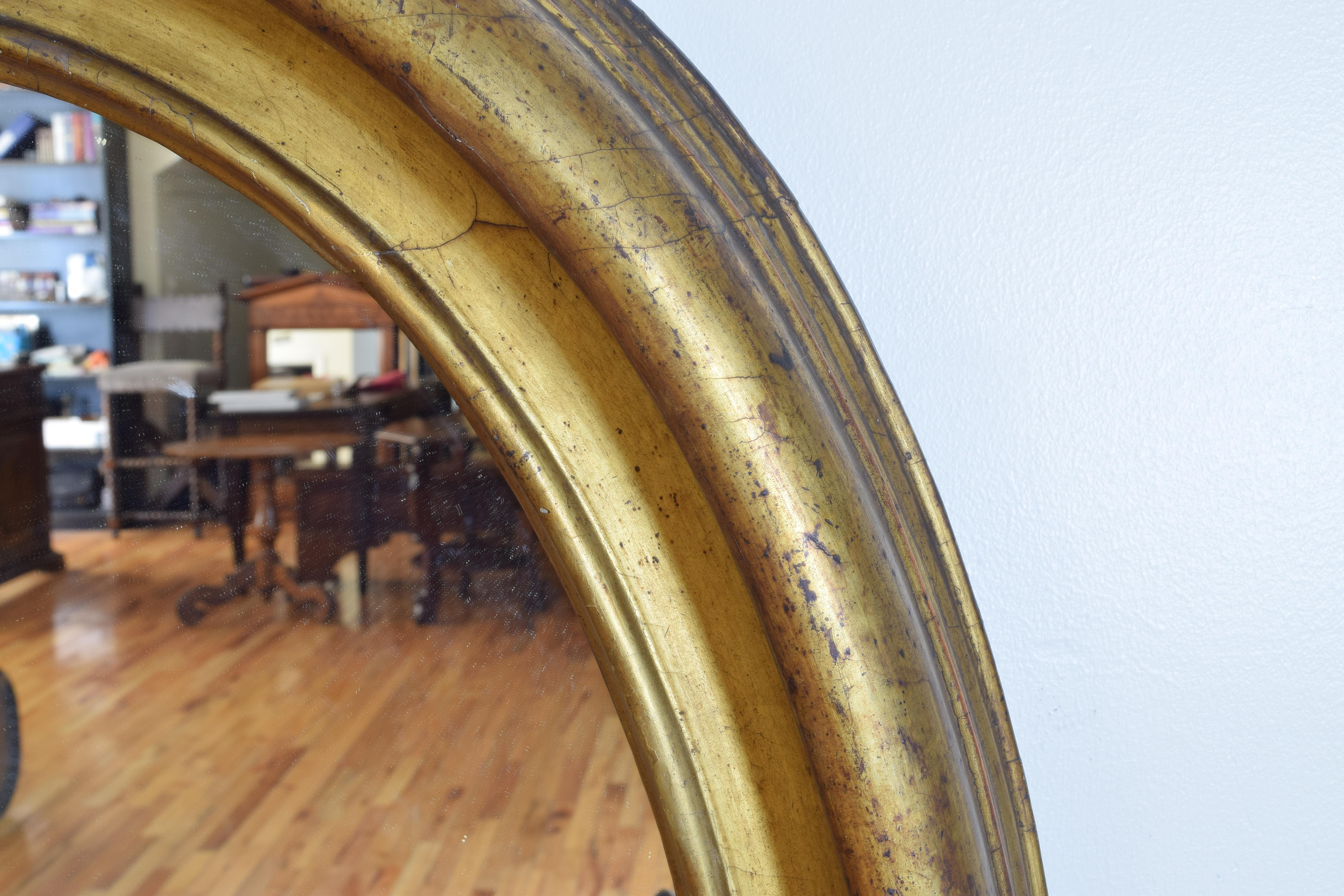 Wood Italian Shaped Giltwood Oval Mirror, Early 18th Century