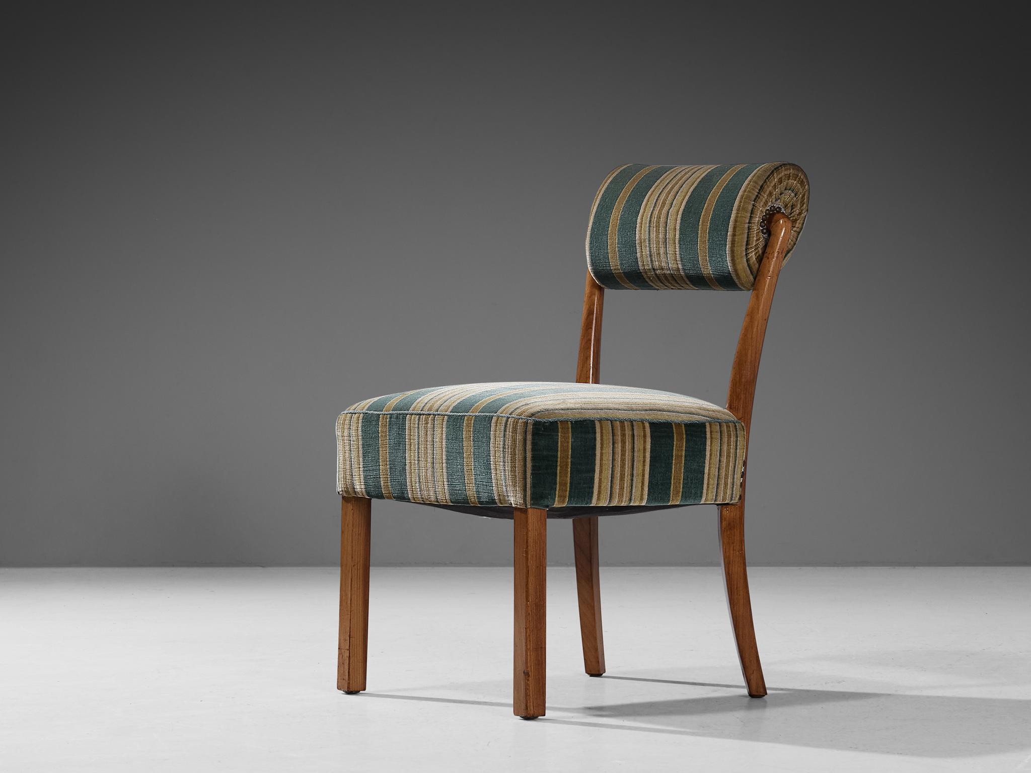 Side chair, walnut, fabric, metal, Italy, 1950s 

This charming side chair shows resemblances with the designs of Carlo de Carli (1910-1999). This chair proves the designer's great eye for proportions and material use. The rear legs are slightly