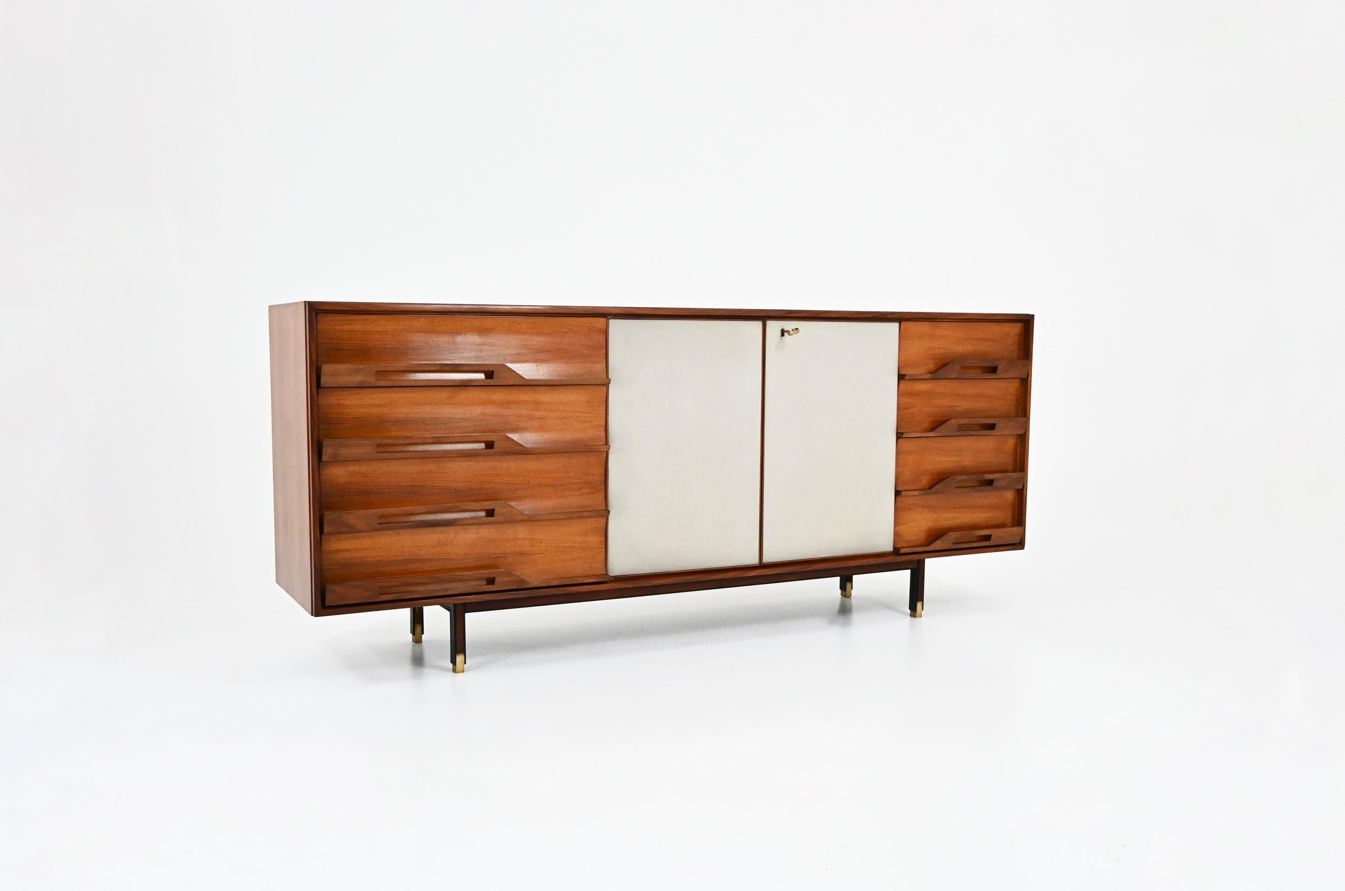 Italian sideboard in wood with metal and wooden legs. It has 5 drawers and 2 sliding doors containing a shelf. Wear due to time and age of the sideboard.
FOR SHIPPING, REQUEST US FOR RECEIVE THE BEST PRICE
