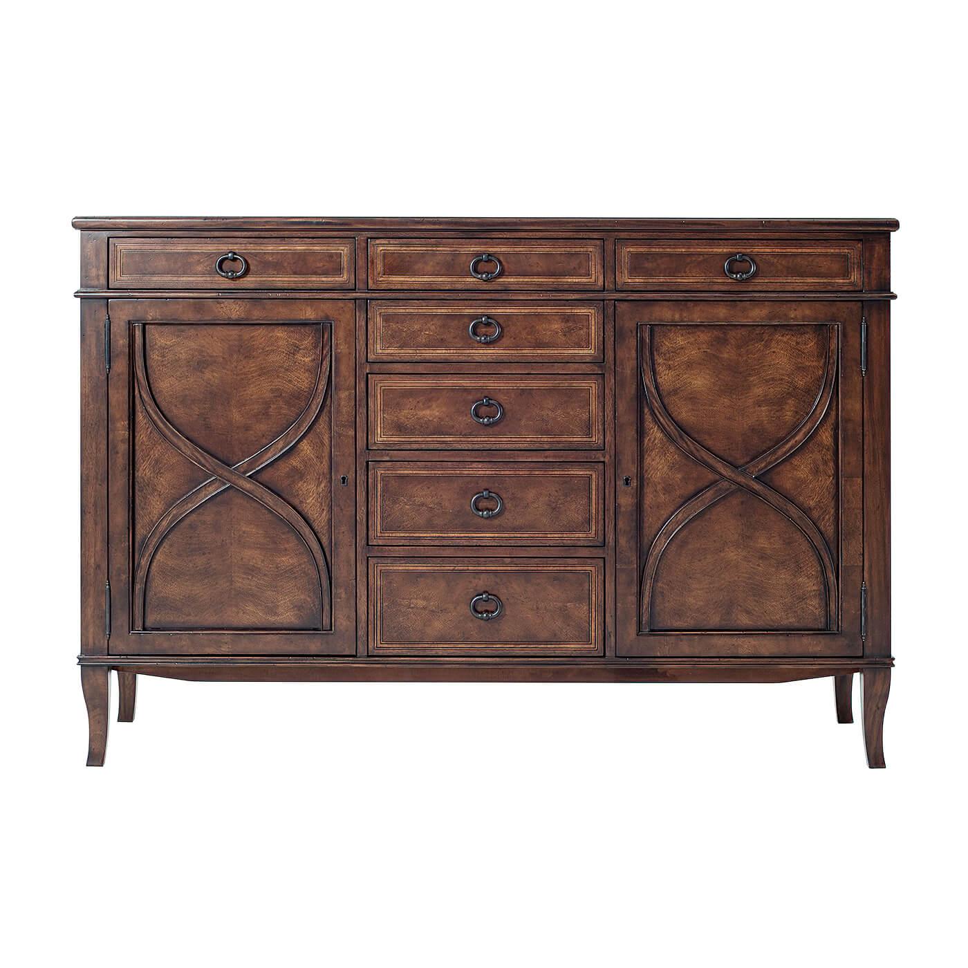 An Italian neoclassic style mahogany sideboard, the rectangular crossbanded top above three short frieze drawers and four further short graduated drawers to the center flanked by two paneled cabinet doors with wavy 'X' applied decoration, each