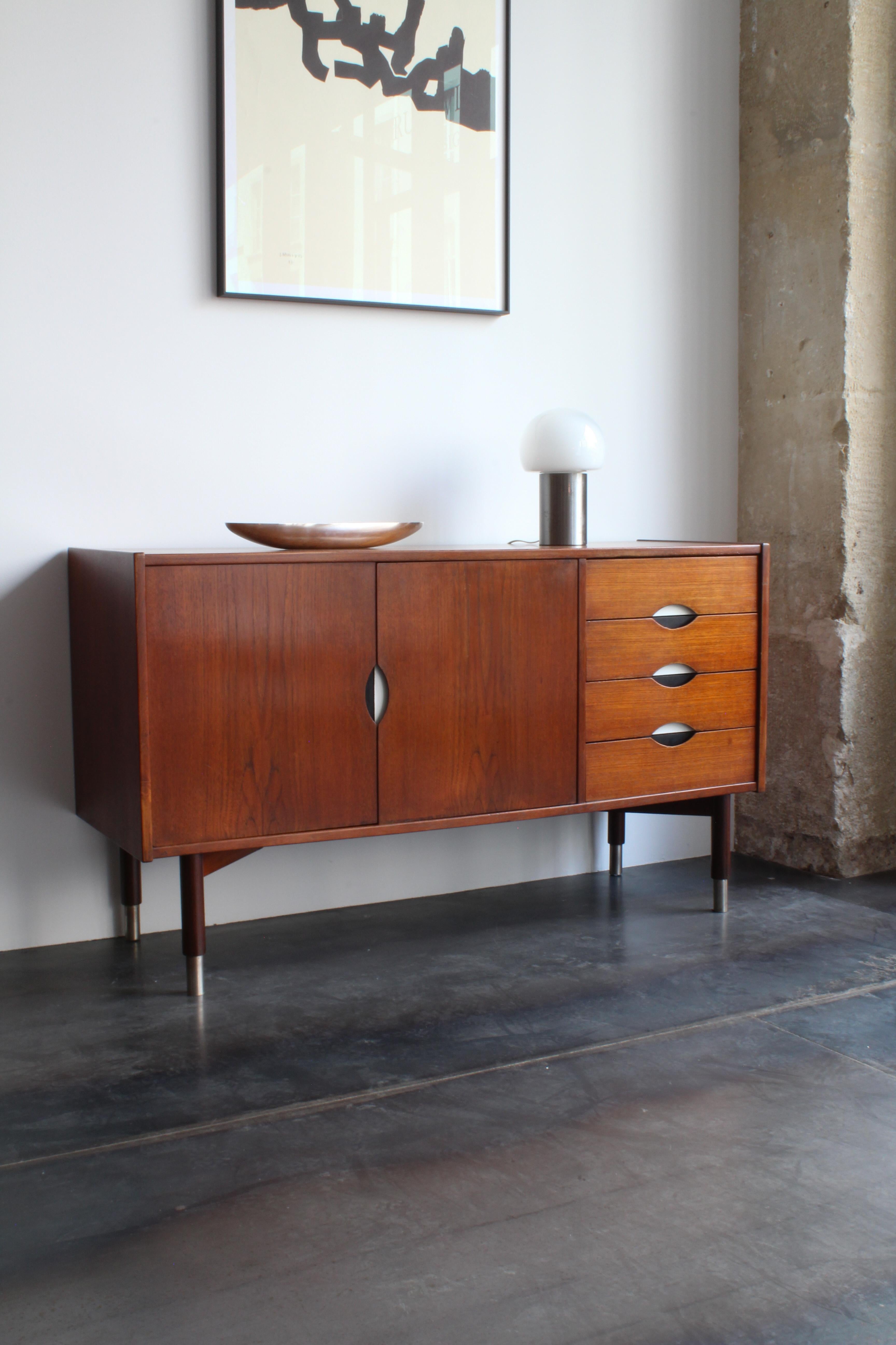 Stildomus was a prominent Italian furniture manufacturer active during the mid-20th century, known for producing high-quality, modernist furniture that embodied the sleek, functional aesthetic of the era. Stildomus sideboards, in particular, are