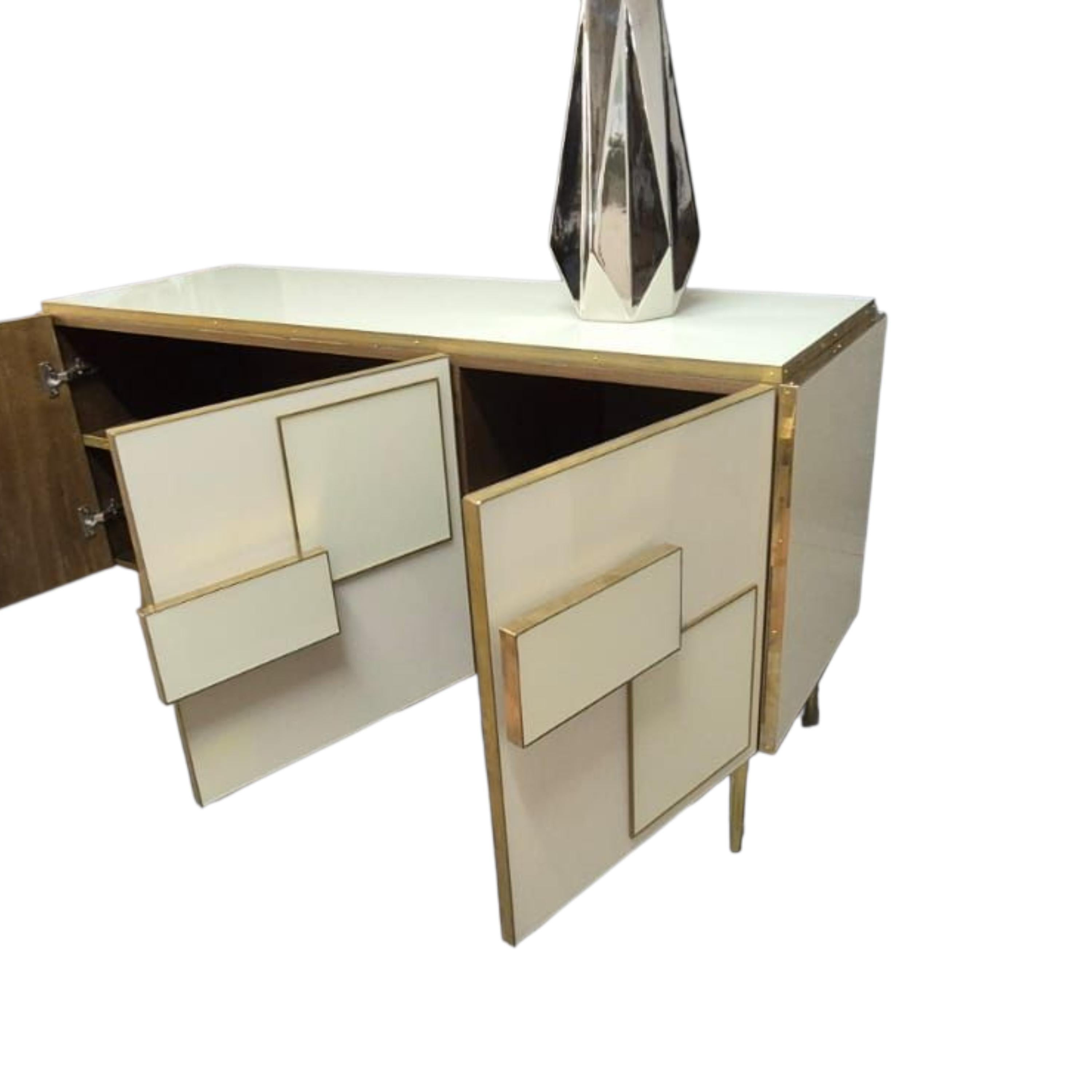 <section>
  <h2>About the Item</h2>
  <p>
    Designed and entirely handcrafted in Italy by <strong>Justfurnituress</strong>, this elegant
    three-door sideboard is a striking example of contemporary Italian craftsmanship, combining
    geometric