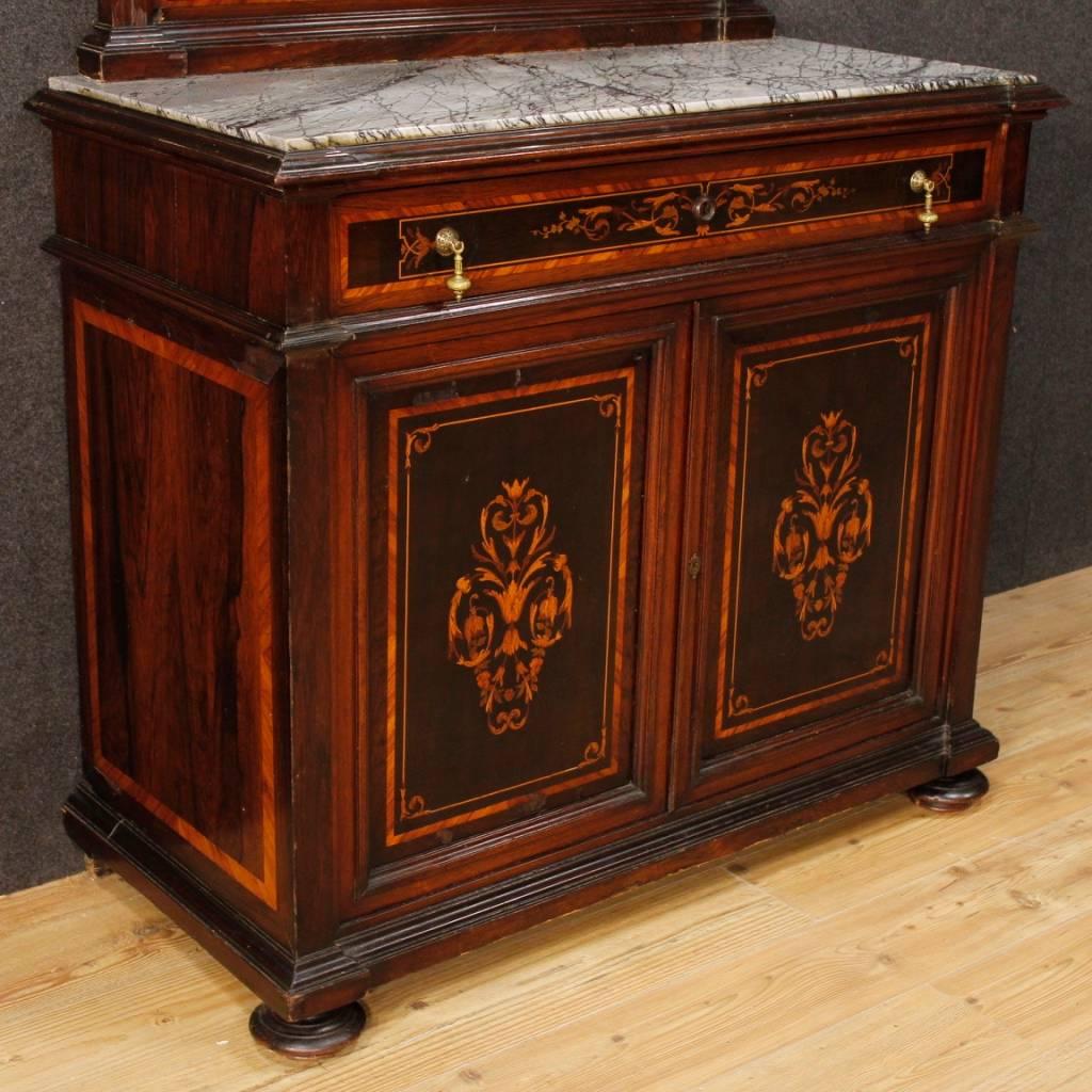 Great Italian sideboard with mirror from the first half of the 20th century. Exceptionally high quality furniture inlaid in walnut, rosewood, mahogany, palisander, maple and fruitwood. Built-in marble top in excellent condition. Sideboard with one
