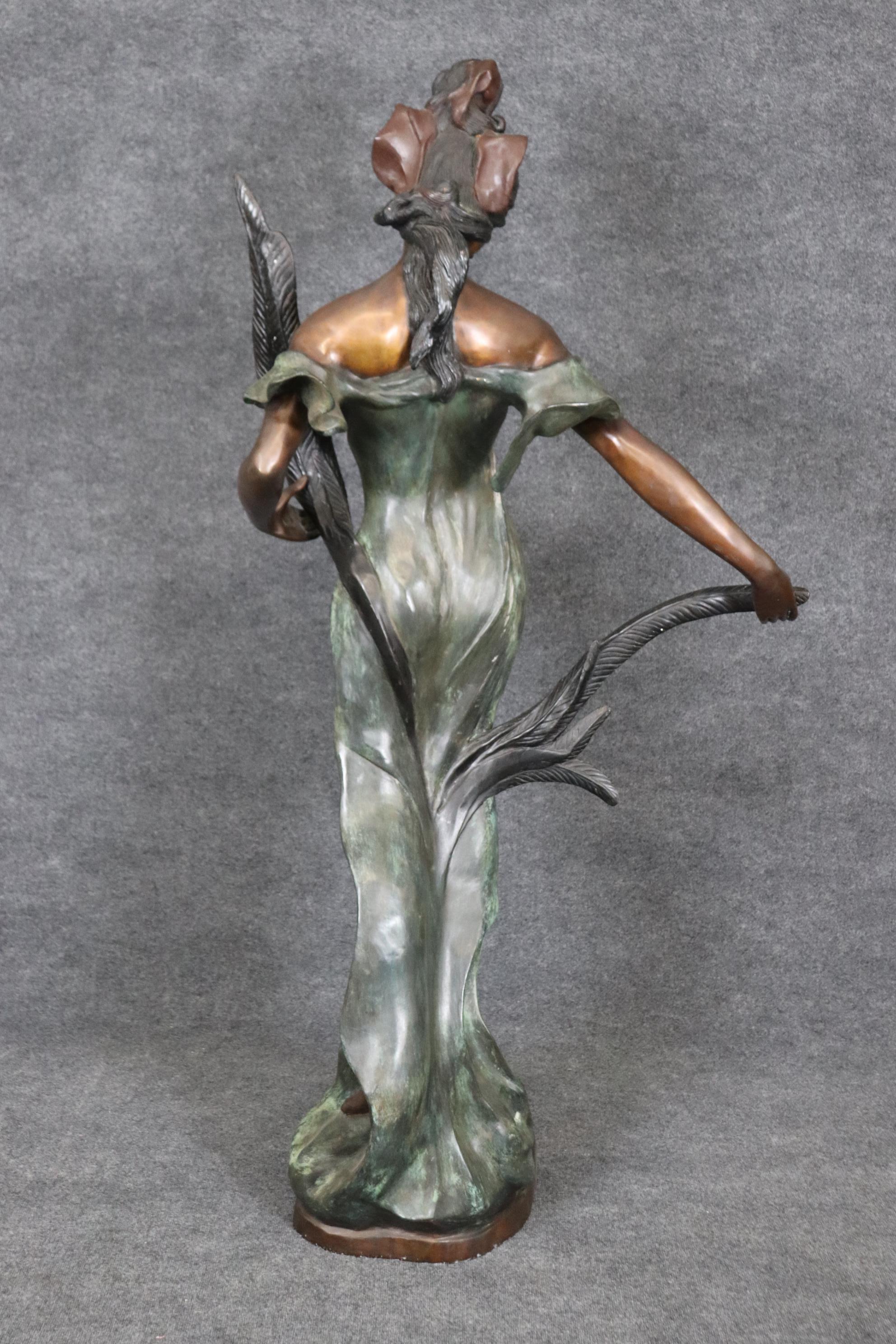 Dimensions- H: 75in W: 37in D: 20in

This Italian signed Eduardo Rossi (1867-1926) Art Nouveau life size bronze sculpture of a woman is an exceptional sculpture and was made with quality in mind!  If you look at the photos provided, you can see it