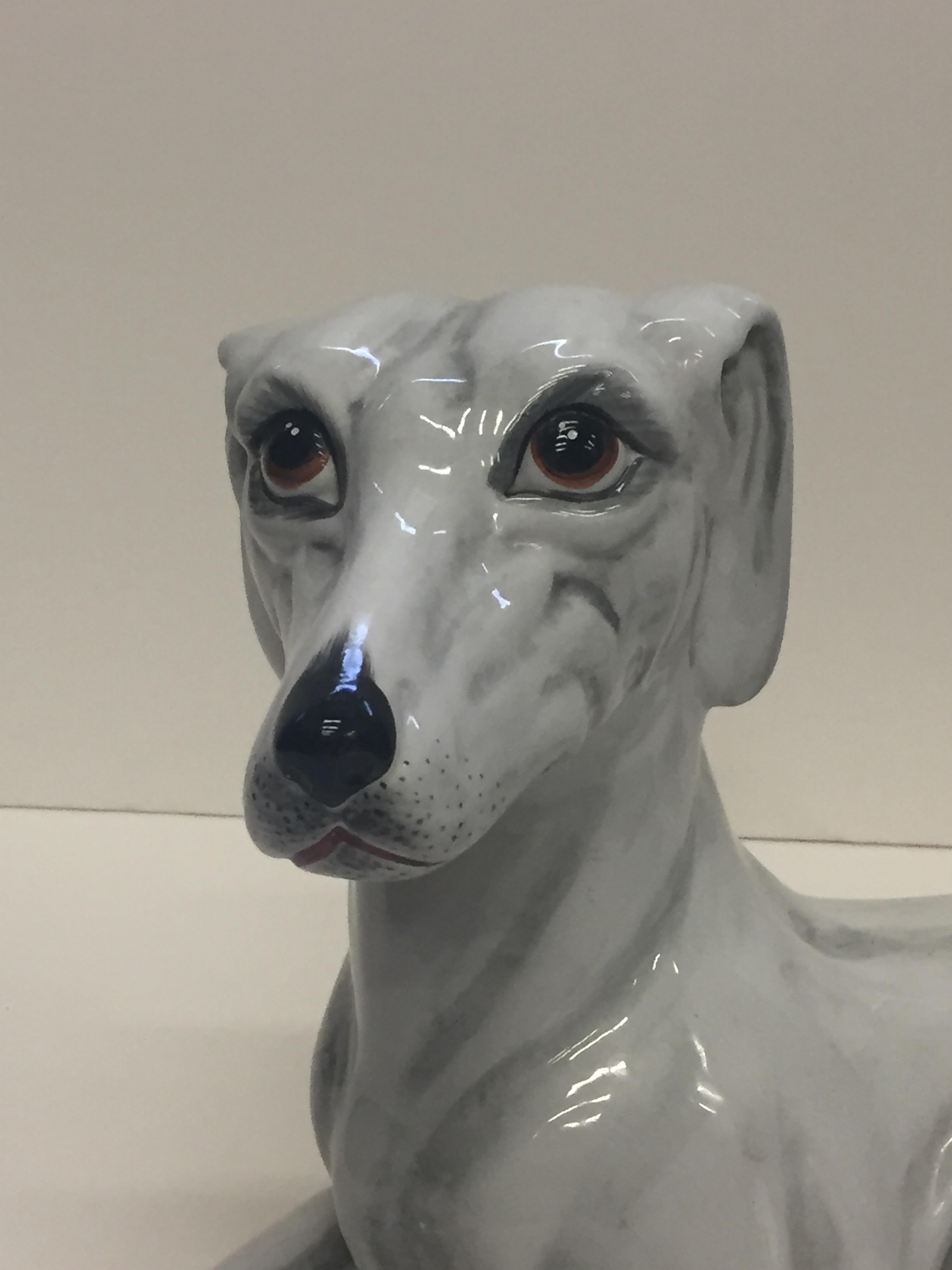 Stylish Italian ceramic sculpture of a regal greyhound dog, marked Italy on the bottom.