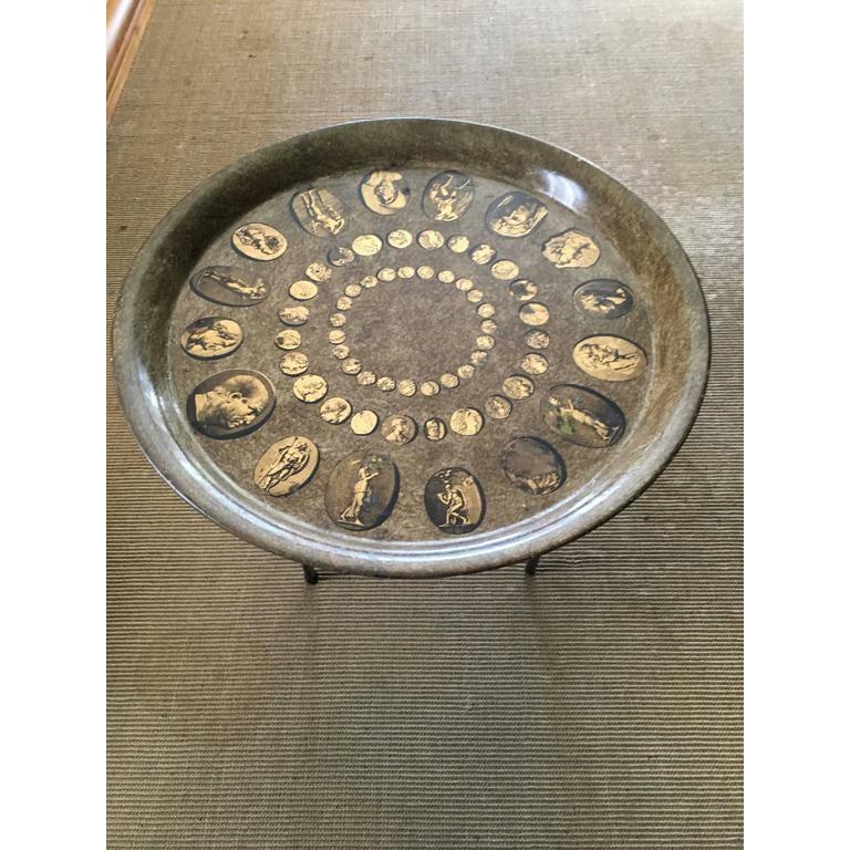 Piero Fornasetti signed tray table on metal stand. A unique piece on a unique and stylish metal stand. The piece is wonderful, and can include a piece of round glass. 

Makes a very nice side table, decorative and very practical as well.